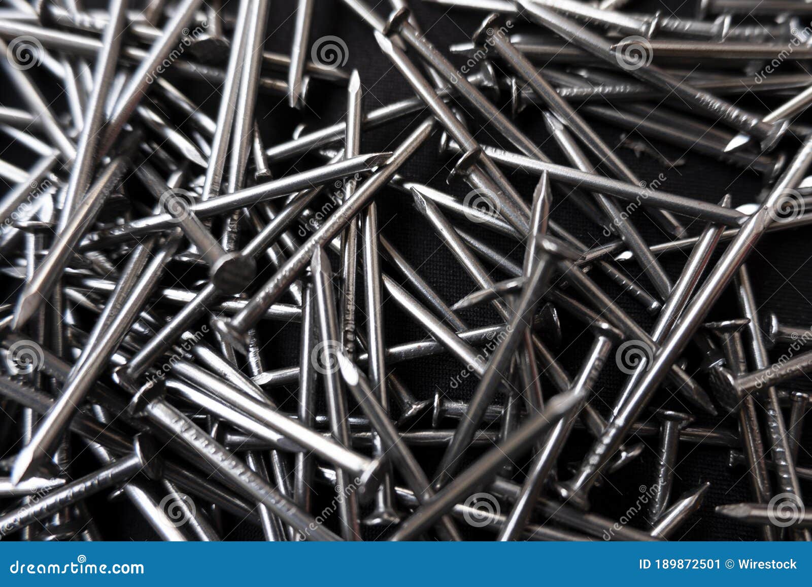 Closeup Shot of a Pile of Steel Nails on a Black Surface Stock Image ...