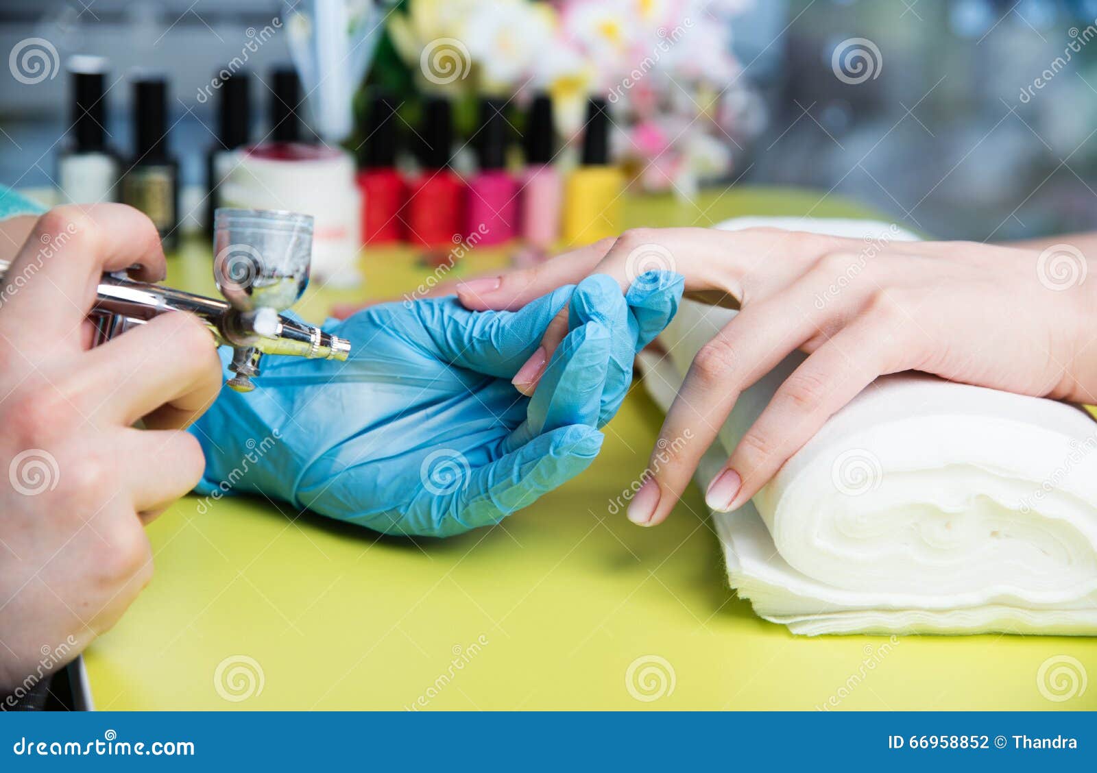 Closeup Shot of a Woman in a Nail Salon Receiving a Manicure by a ...