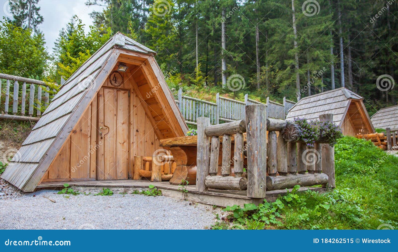 closeup of a small wooden cabin at hija glamping lake bloke in nova vas, slovenia