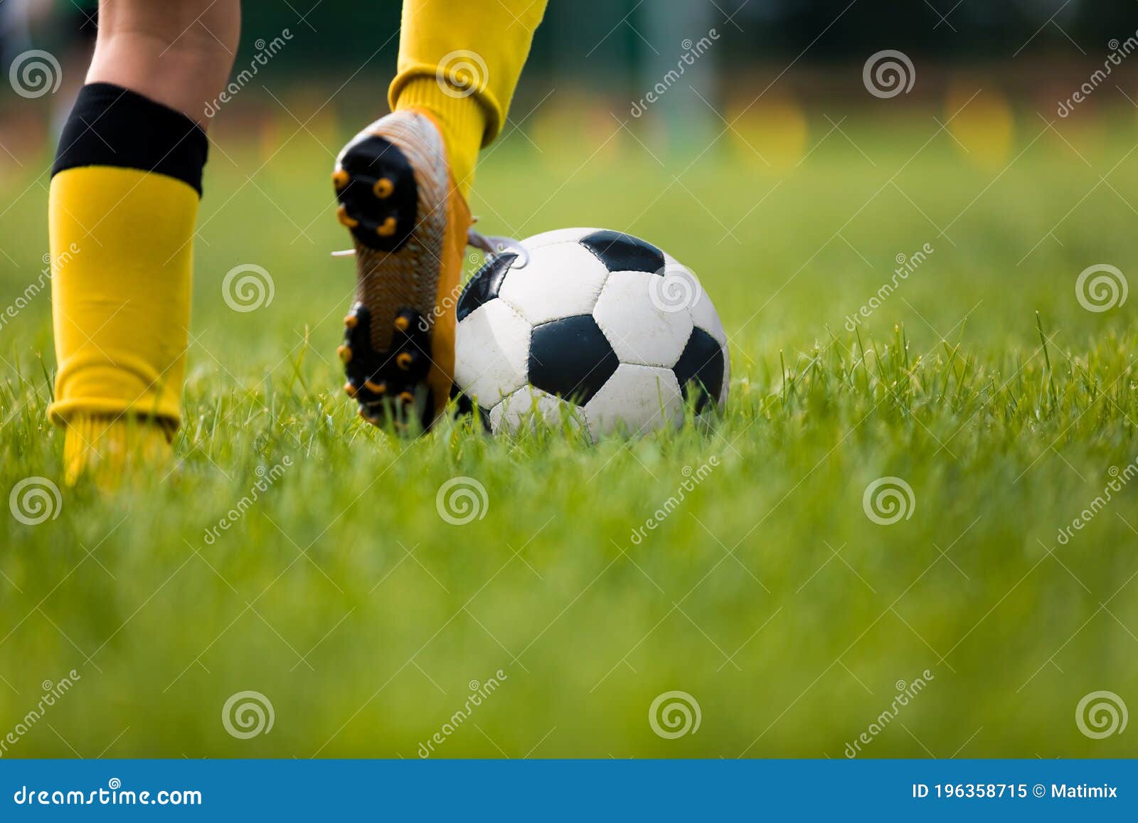 Closeup Of Soccer Player Running And Kicking Soccer Ball On Grass Lawn Stock Image Image Of Game Legs Closeup Of Soccer Player Running And Kicking Soccer Ball On Grass Lawn Stock Image Image Of Game Legs