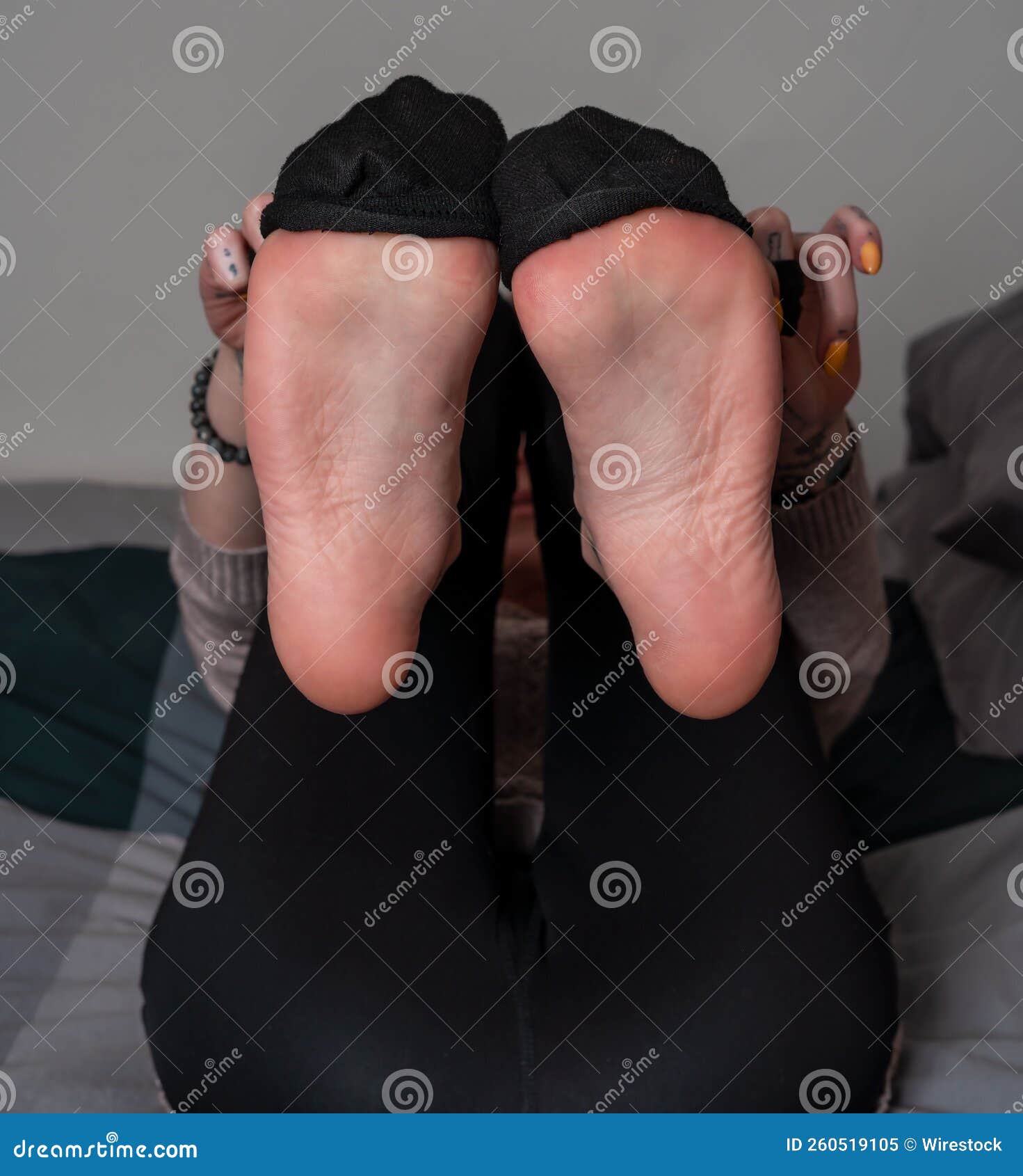 Closeup of the Soles of Female Feet with Socks Lying in a Bed Stock Image -  Image of elegance, caucasian: 260519105