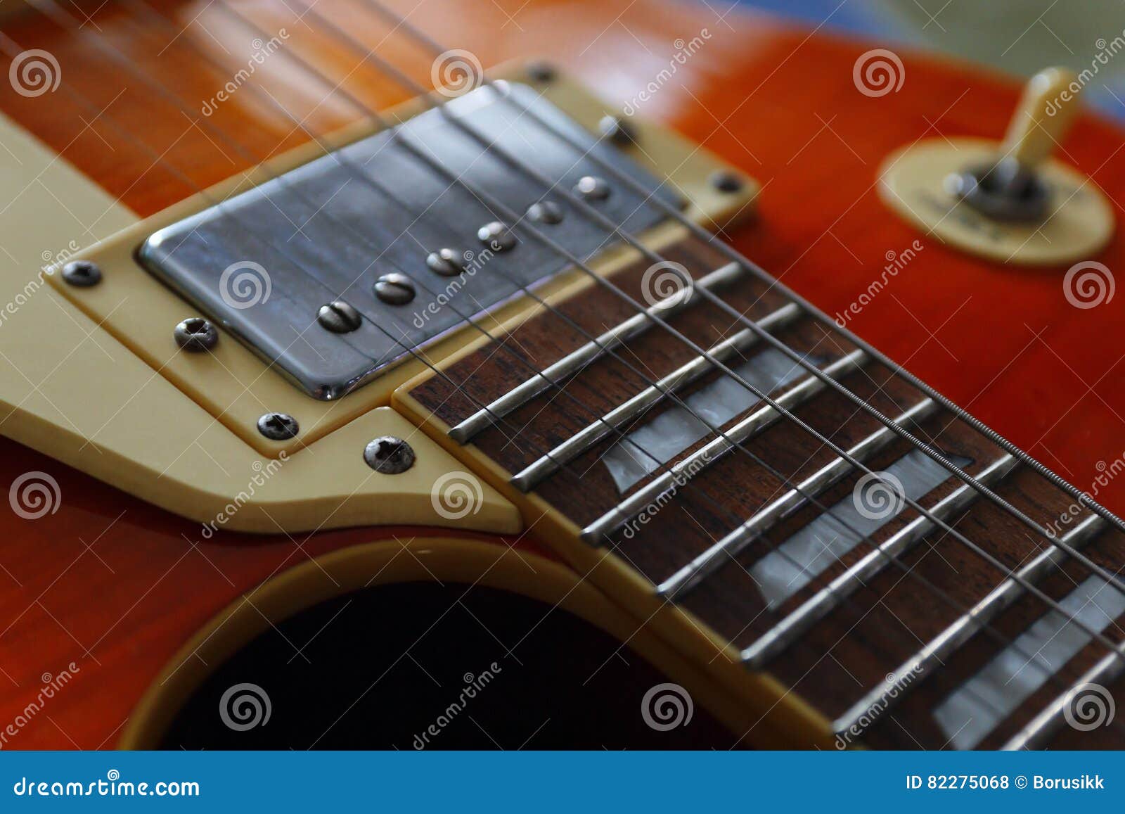 Closeup of Solid Body Electric Guitar. Detail, Selective Focus, Low Key