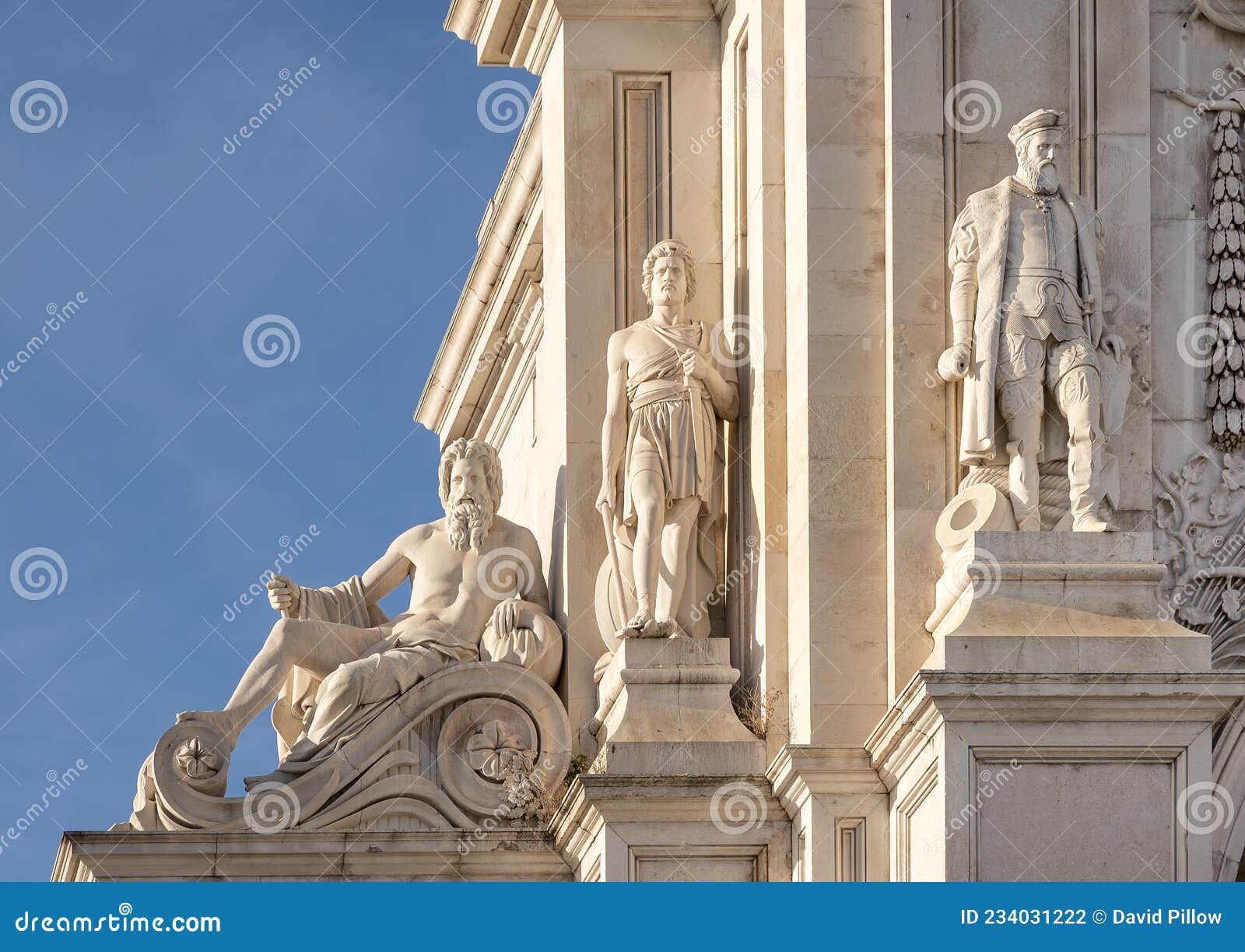 closeup statues on the arco triunfal in the da rua augusta praca do comercio in lisbon, the capital of portugal.