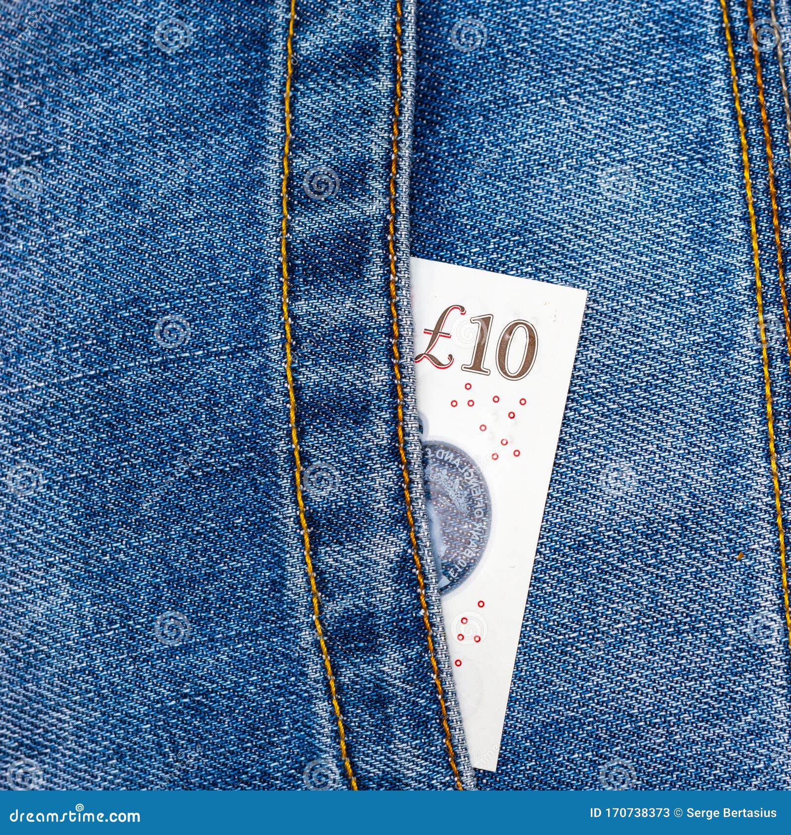 Closeup of Ten Pounds Sterling Banknote Peeking Out of Blue Jeans Back ...