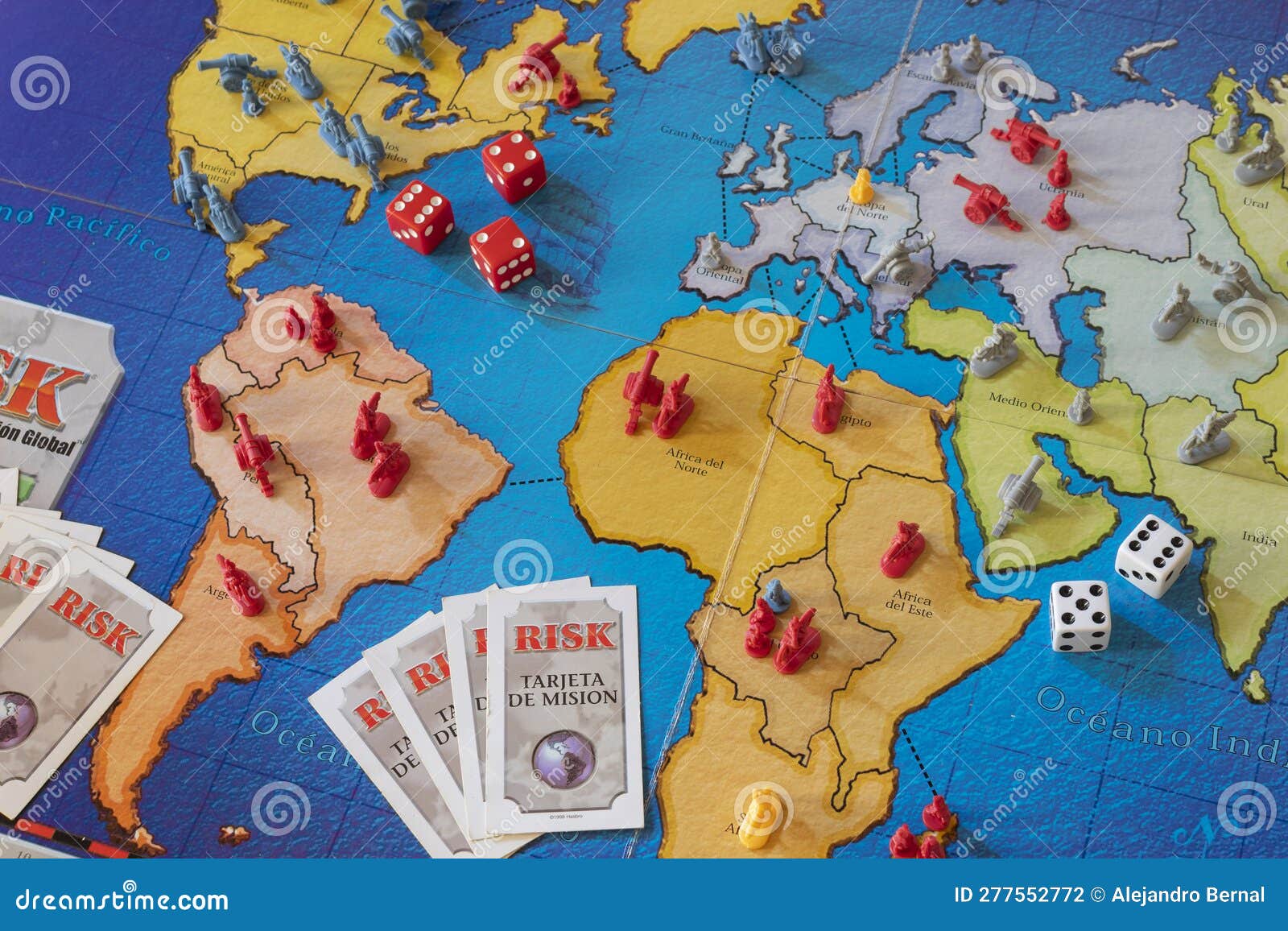Closeup To a Classic Risk Board Game Map with Small Figures Dices