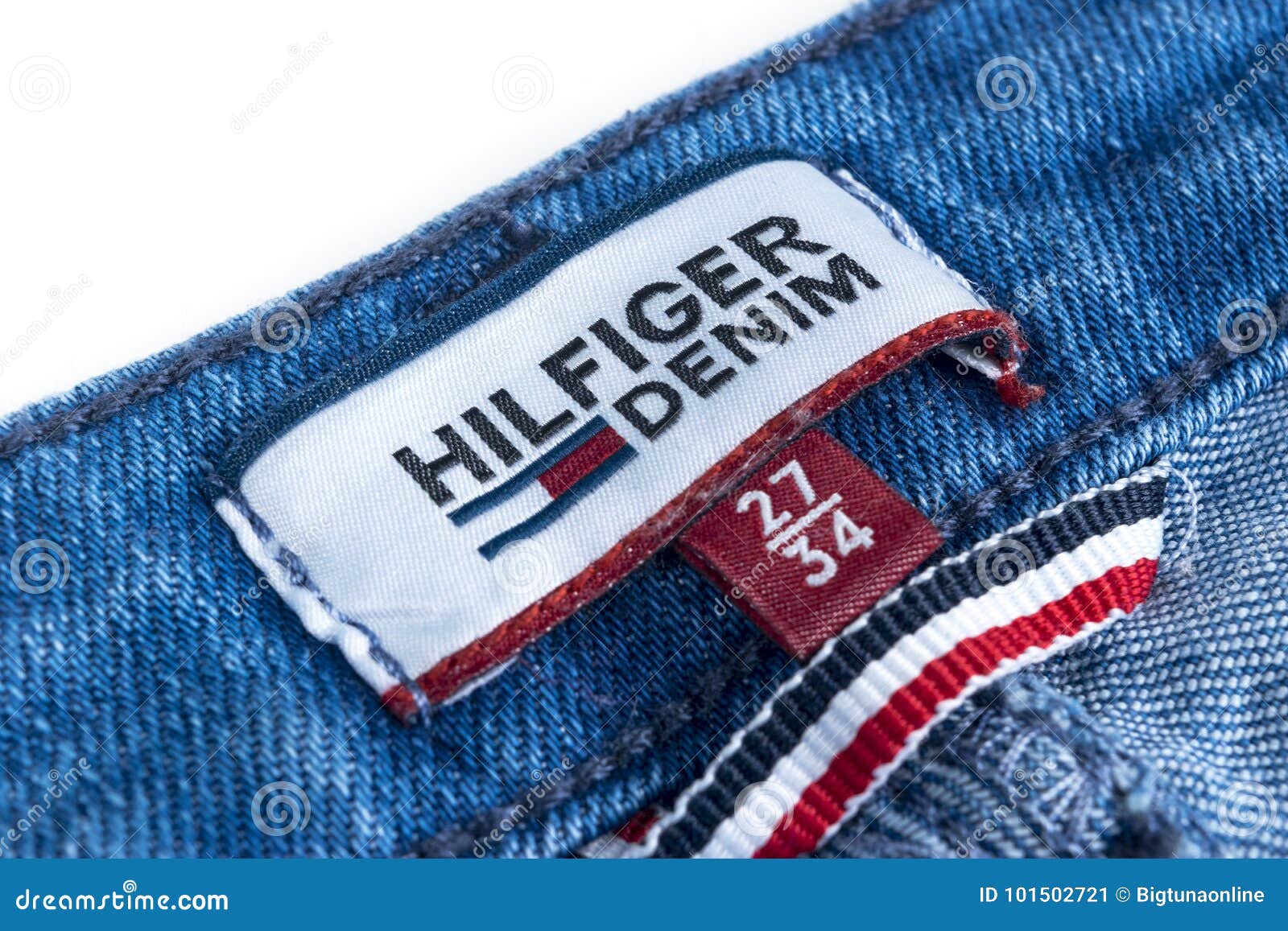 Closeup Of Tommy Hilfiger Label On Blue 