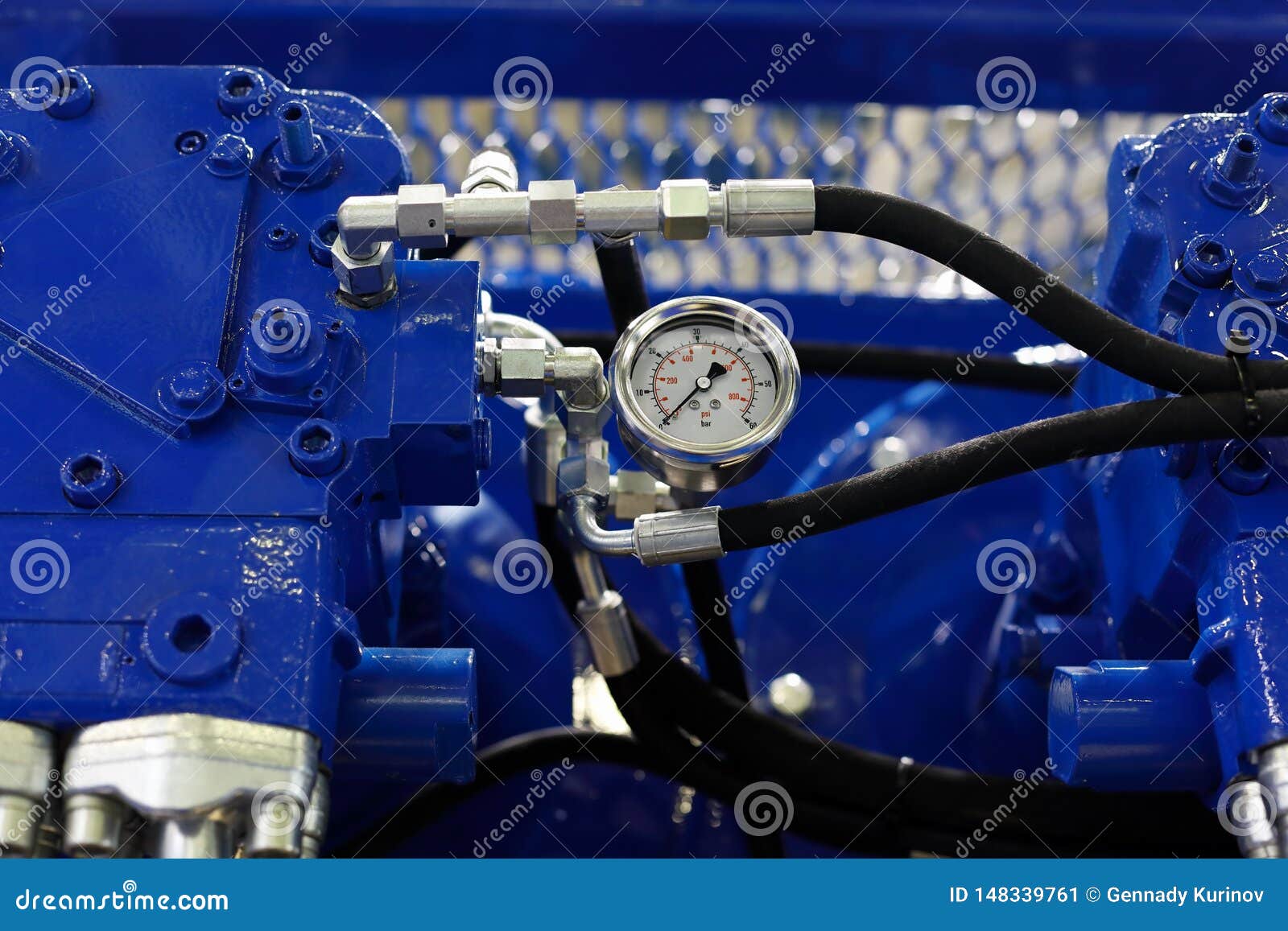 closeup view of air compressor with pressure gauge