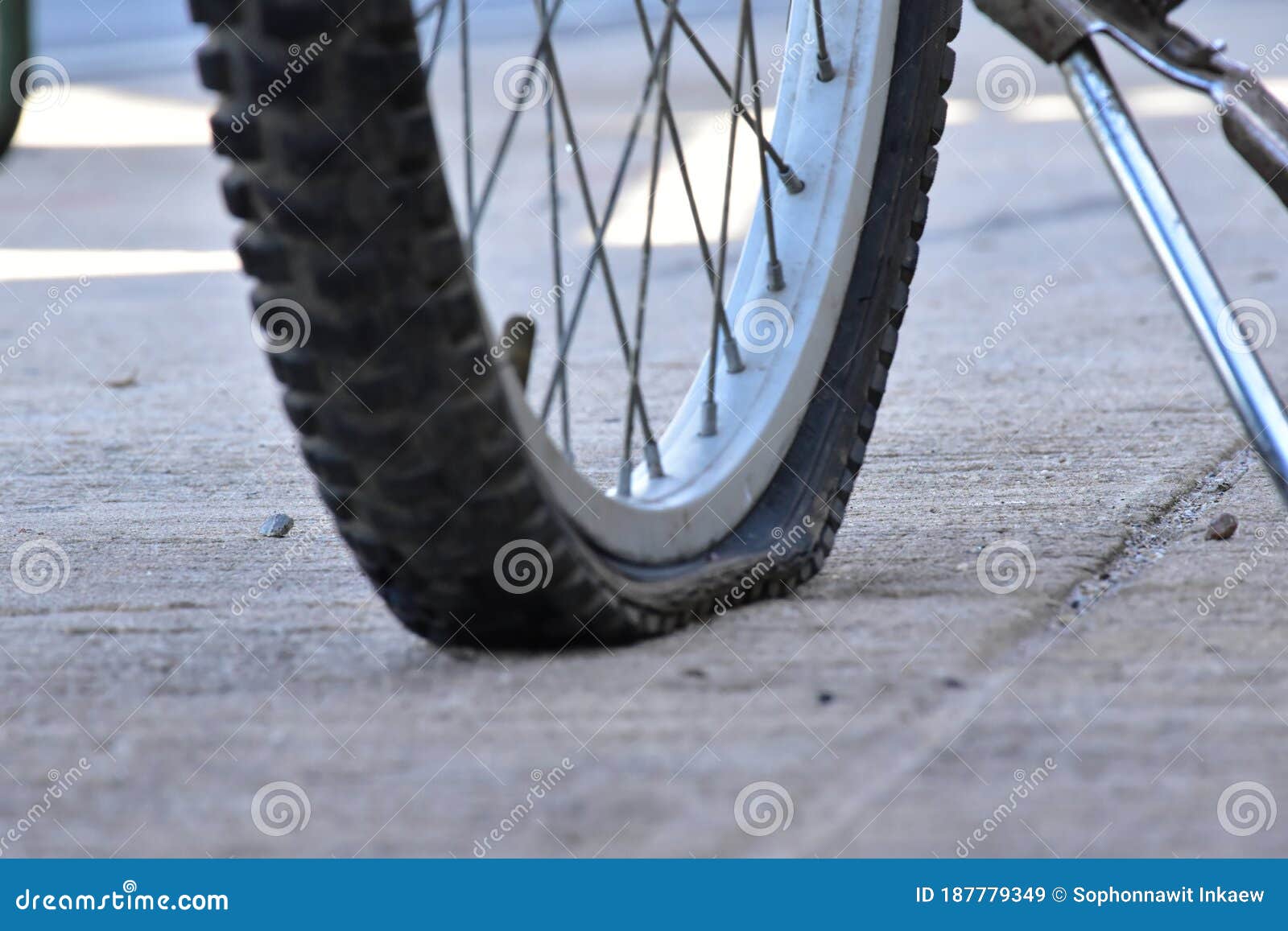 Bicycle flat tires stock image. Image of action, public 187779349