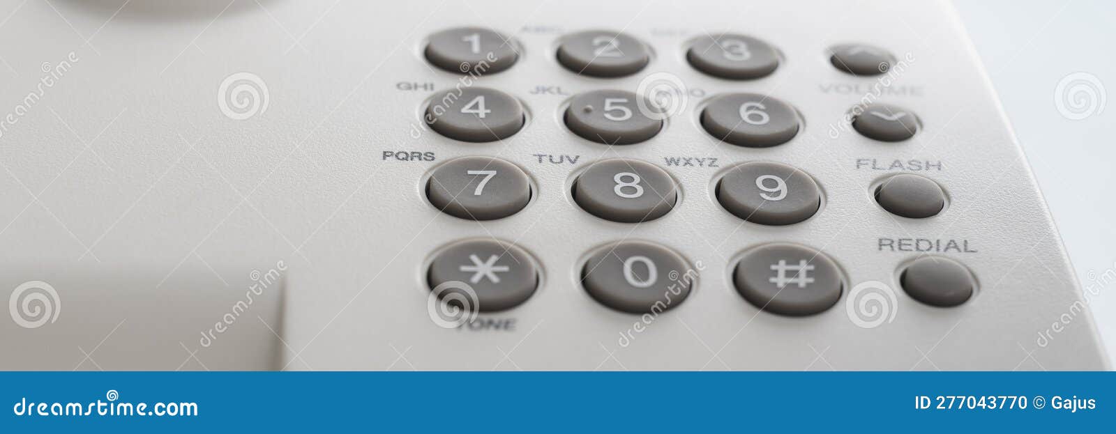 Closeup View of Keypad of Classical White Landline Telephone Stock
