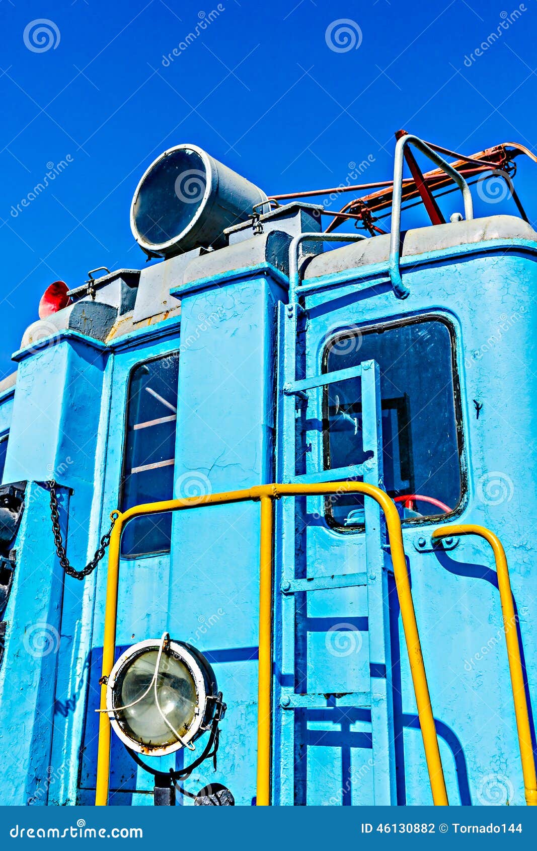 closeup view of a service electical railroad engine of blue colo