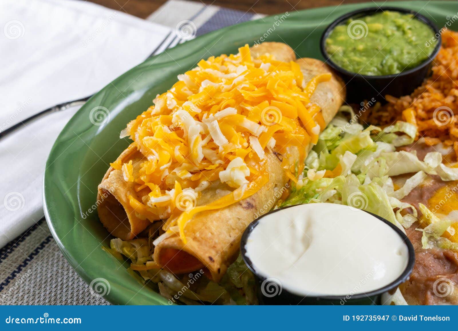 Two taquitos plate stock image. Image of background 192735947