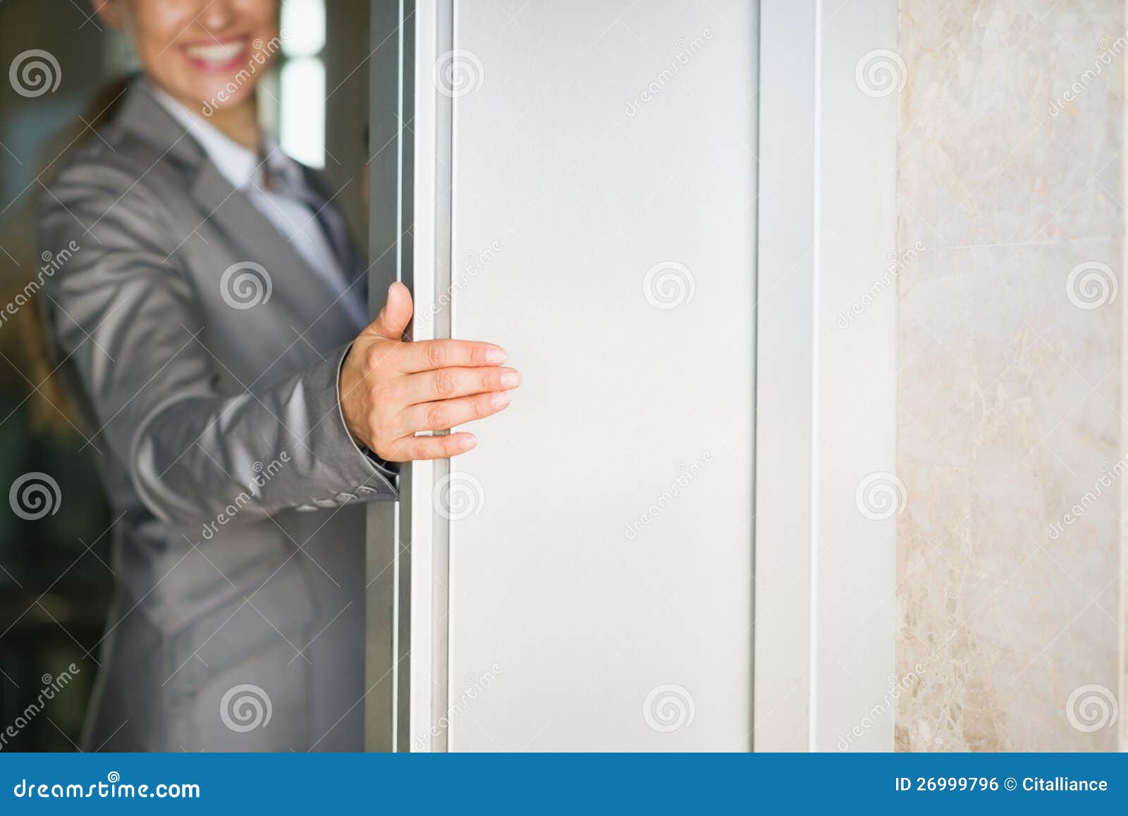 Closeup On Woman Hand Holding Elevator Door Stock Photo Image of elevator, executive 26999796