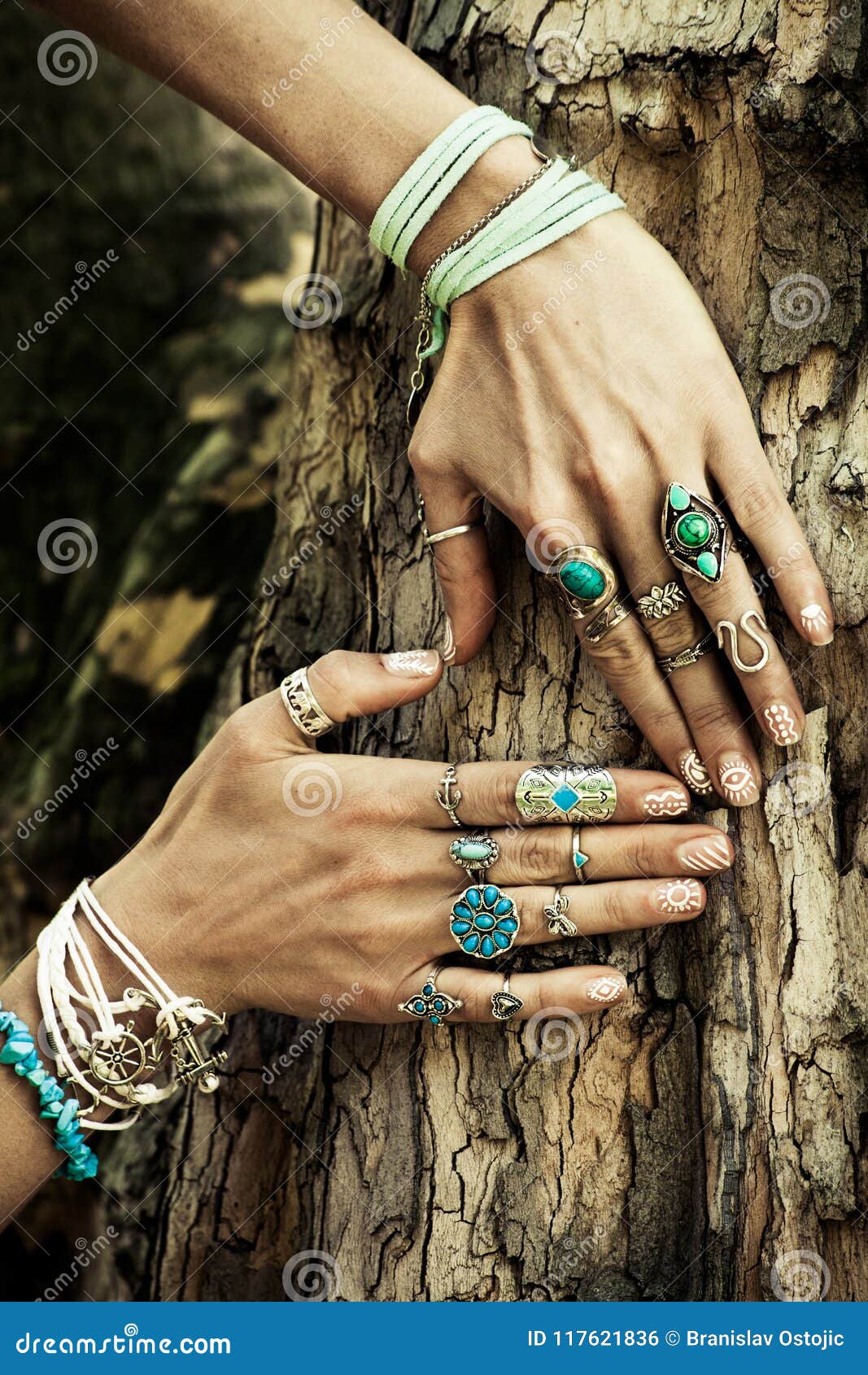 closeup of woman hand on tree surface in heart  with lot o