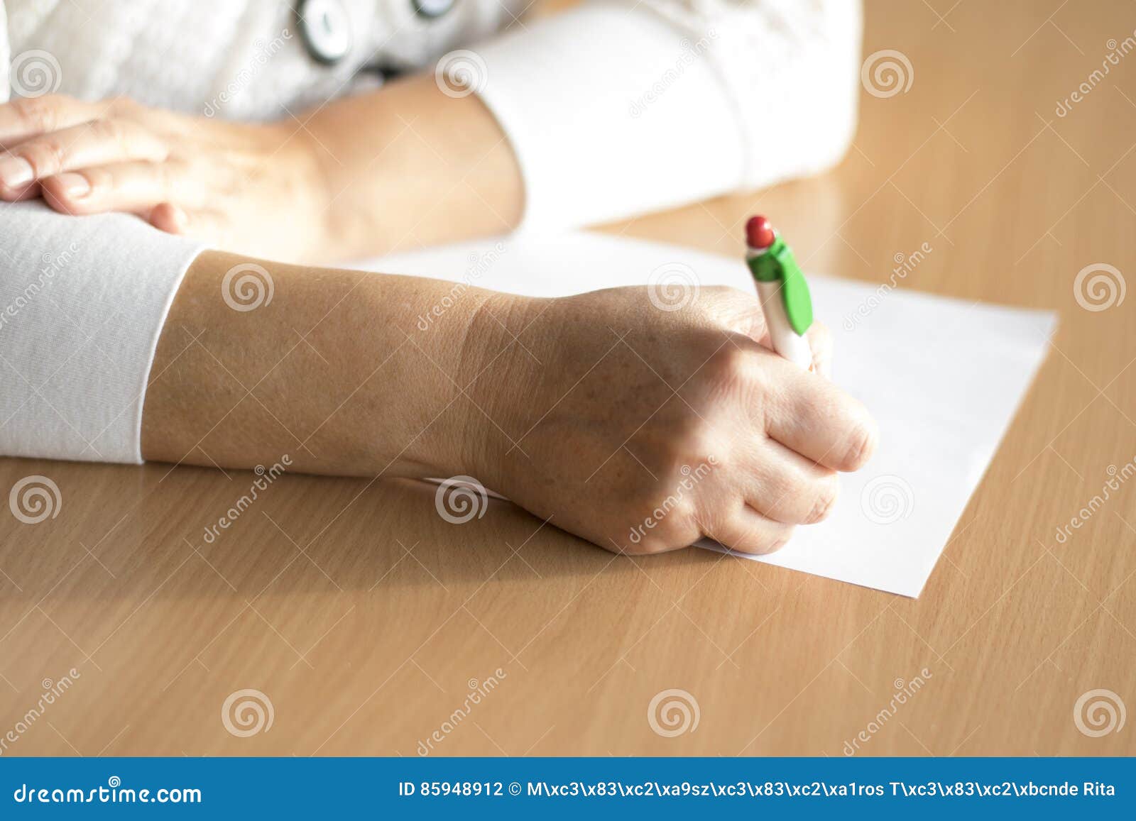 Closeup Woman`s Hand Writing on Paper Stock Photo - Image of document ...