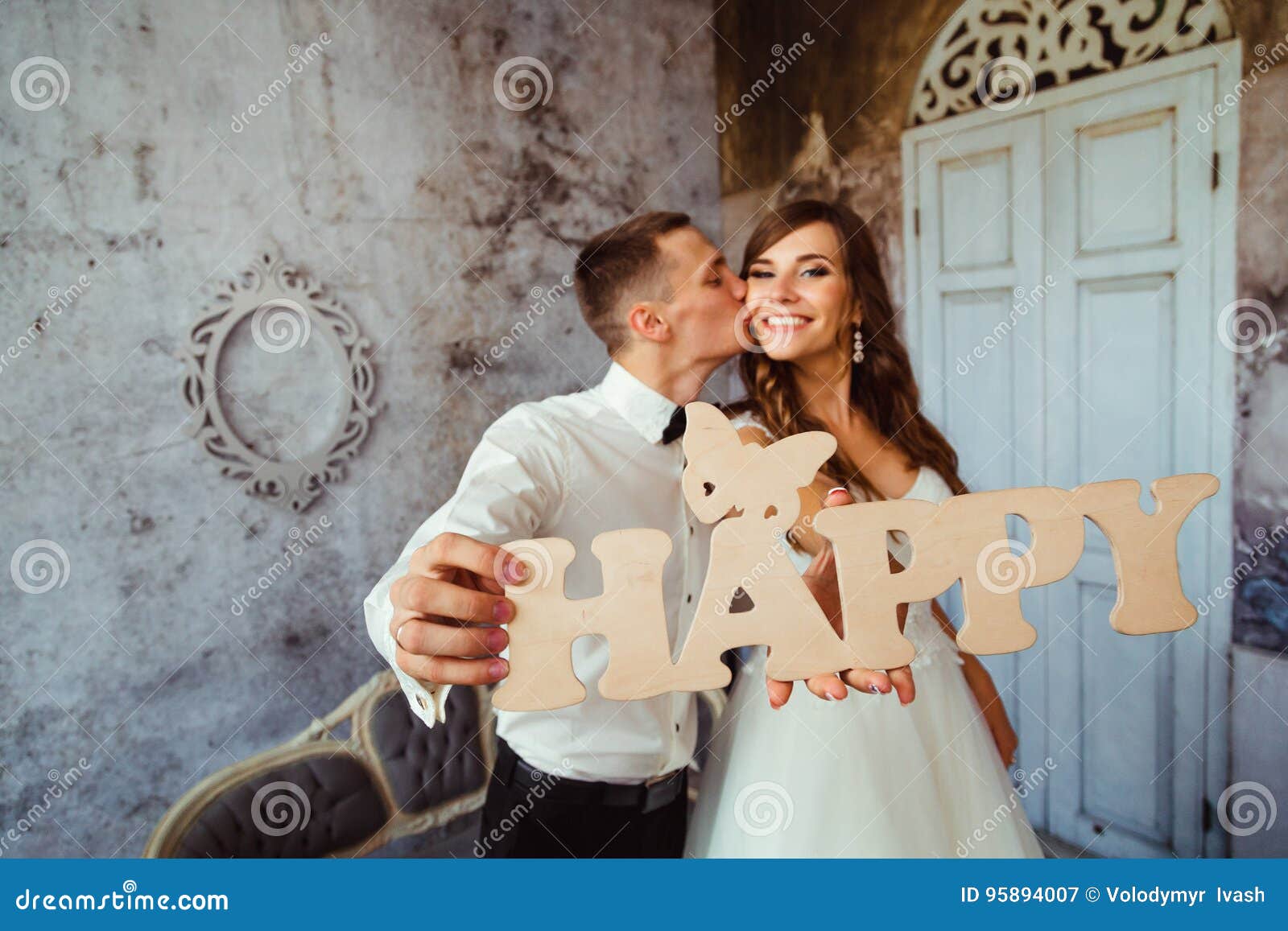 Closeup Of Wooden Lettering Happy Held By Wedding Couple ...