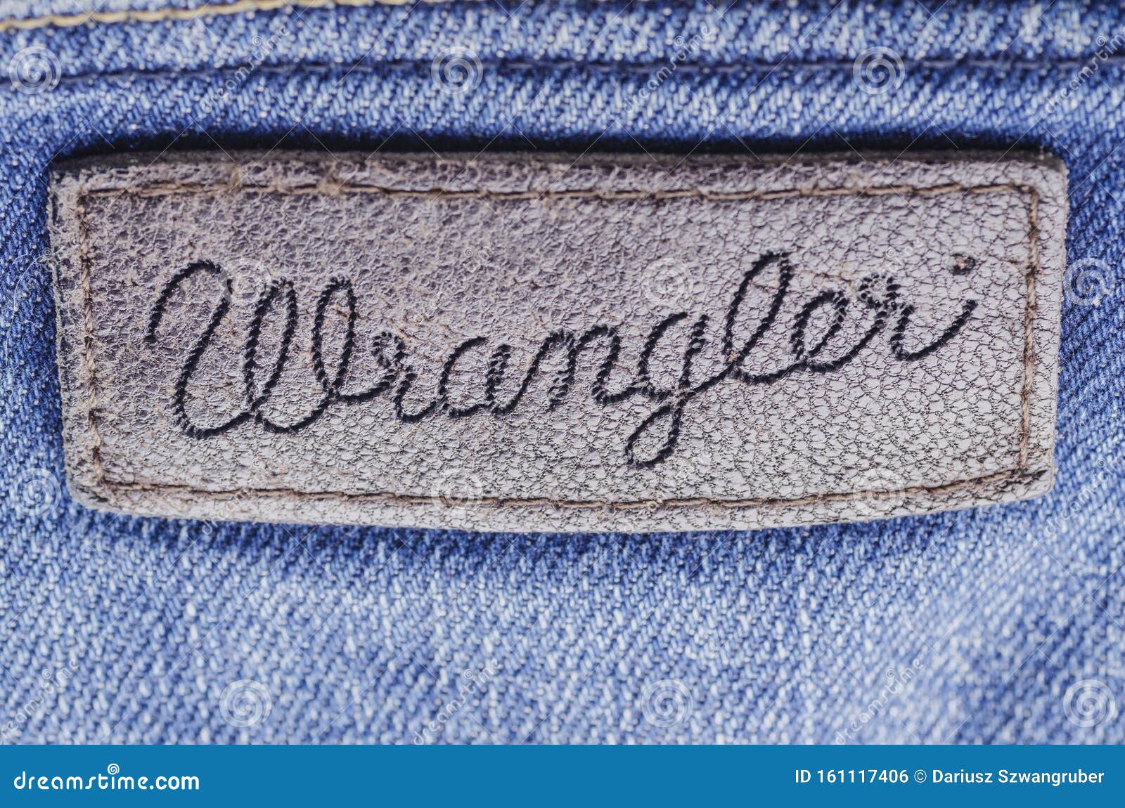 Closeup Of Wrangler  Label  On Blue Jeans Editorial Photo 