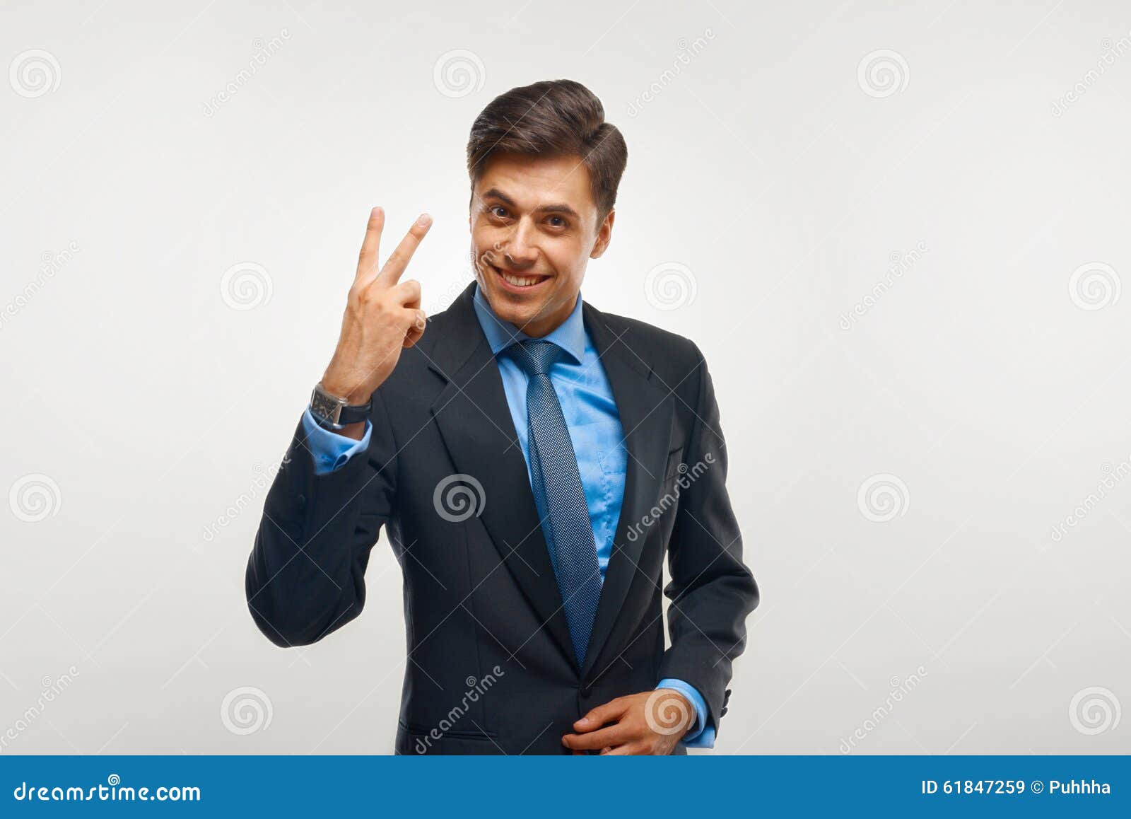 Closeup of a Young Business Man Showing Showing Two Number. Stock Image ...