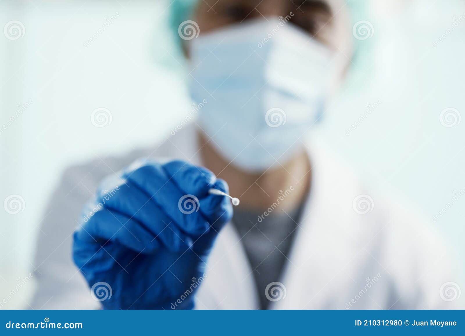 male nurse taking a nasopharyngeal culture