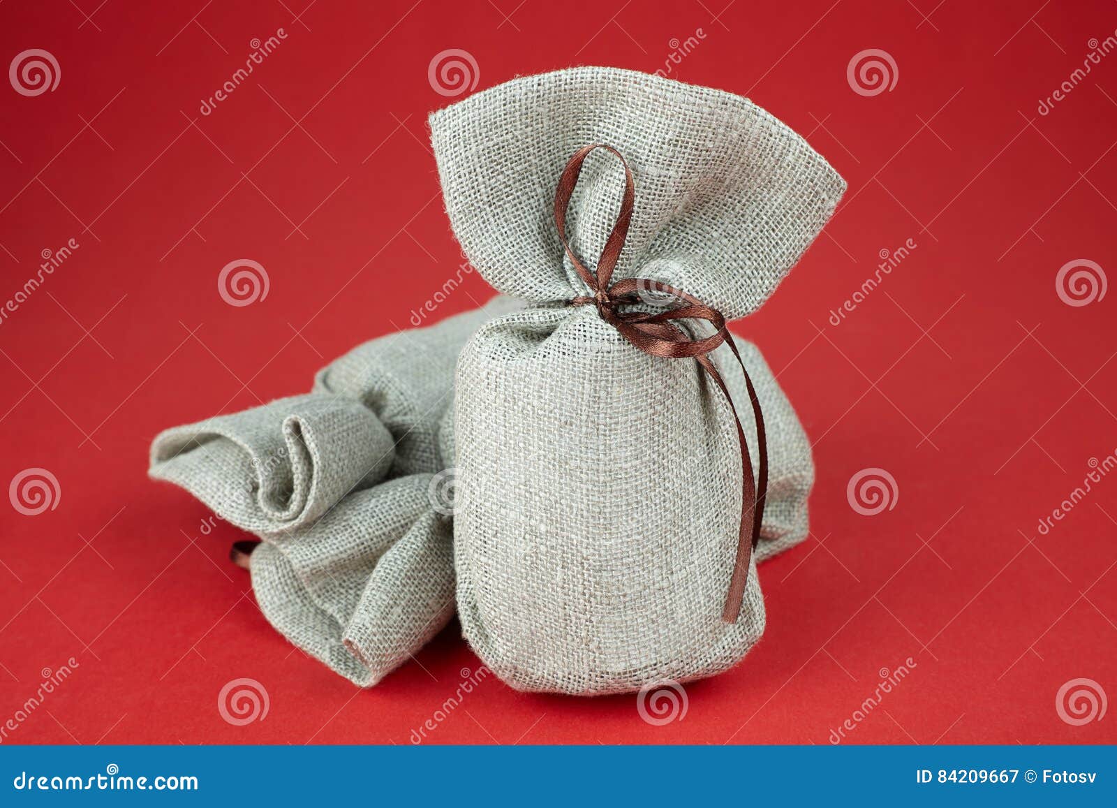 Cloth bag with a gift stock image. Image of burlap, holiday 84209667