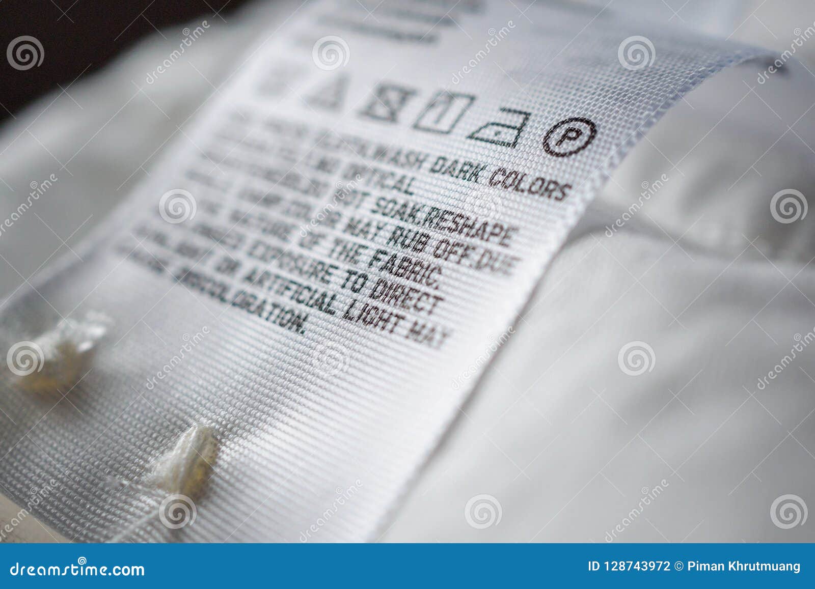 Cloth Label Tag with Laundry Care Instructions Stock Photo - Image of ...
