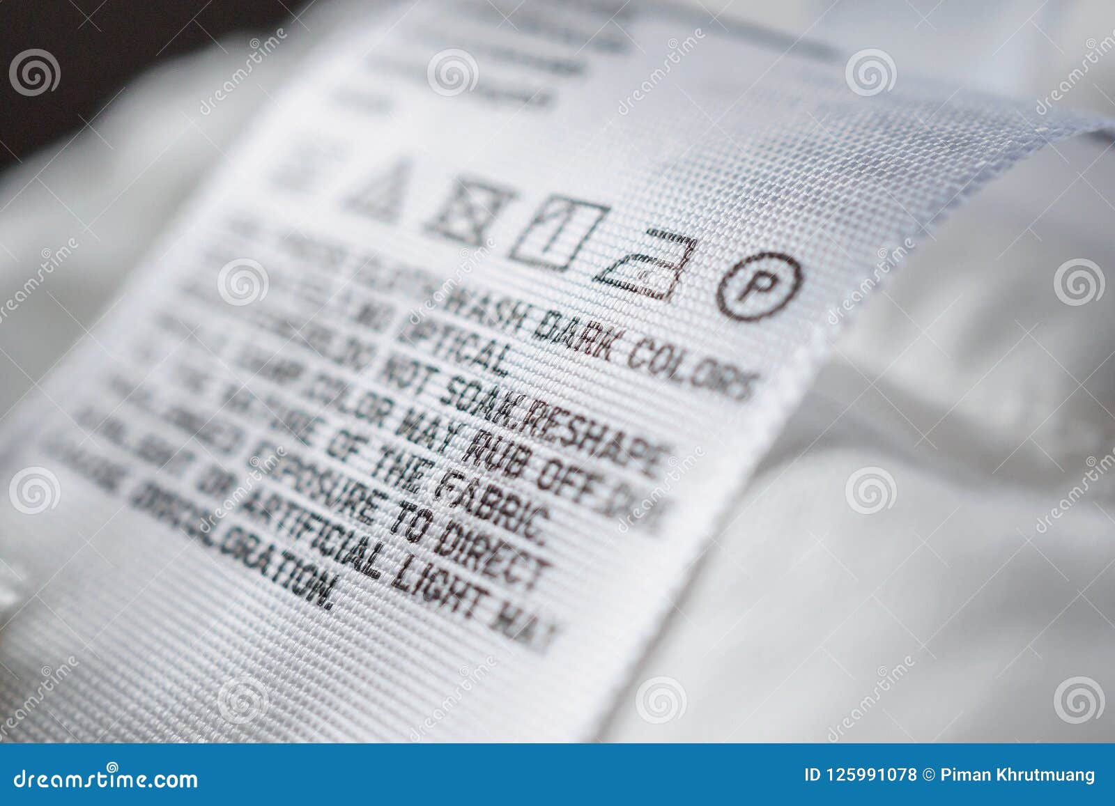 Cloth Label Tag with Laundry Care Instructions Stock Photo - Image of ...