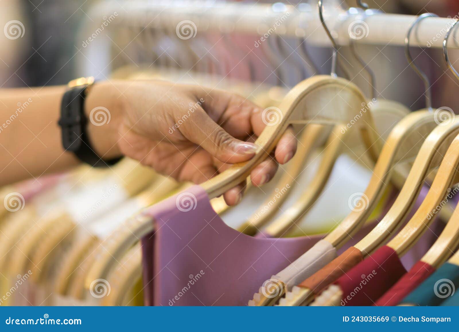 Clothes that are Arranged on Shelves and Hangers Stock Image Image of