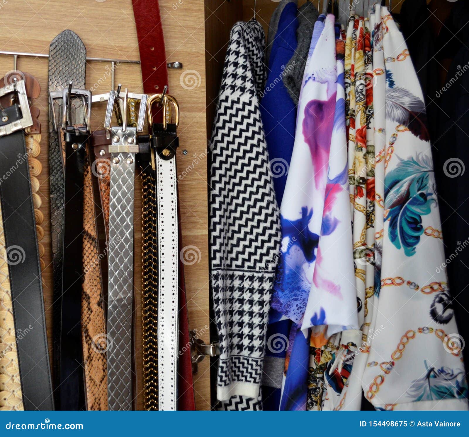 Clothes and Belts in Wardrobe, Close Up. Stock Image - Image of ...