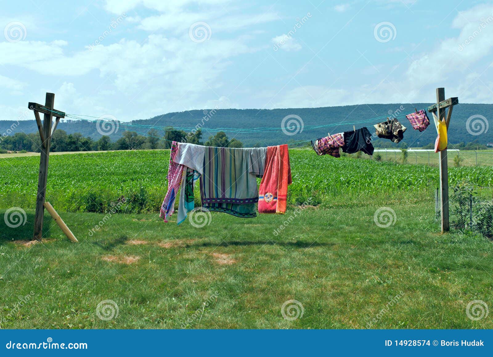 Clothes on a clothesline. stock photo. Image of drying 14928574