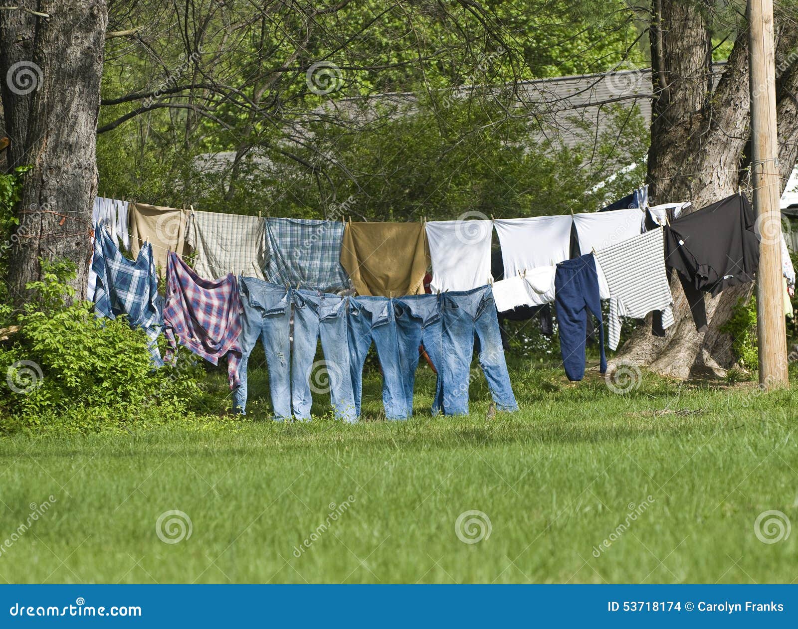Clothes Drying Outdoors on Clothes Line Stock Photo - Image of