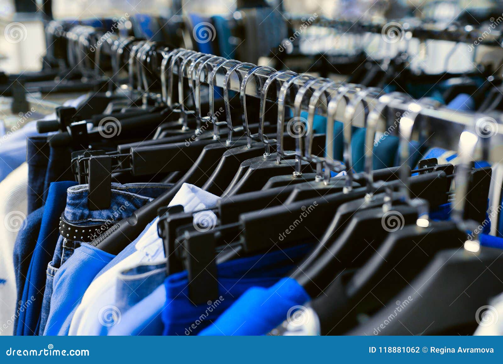 Clothes Hanging on the Hanger Stock Photo - Image of blue, rack: 118881062