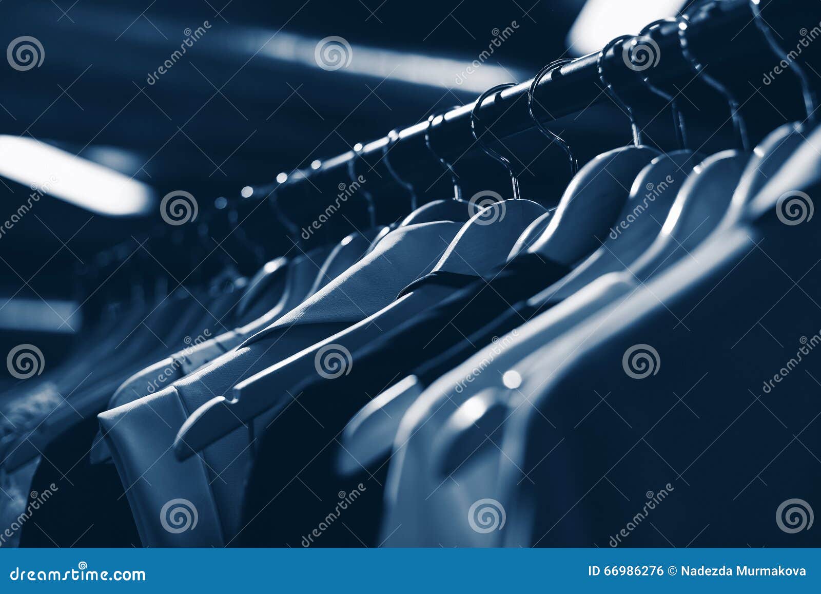 Clothes Hangers in Fashion Store. Clothes Business Concept Stock Photo ...