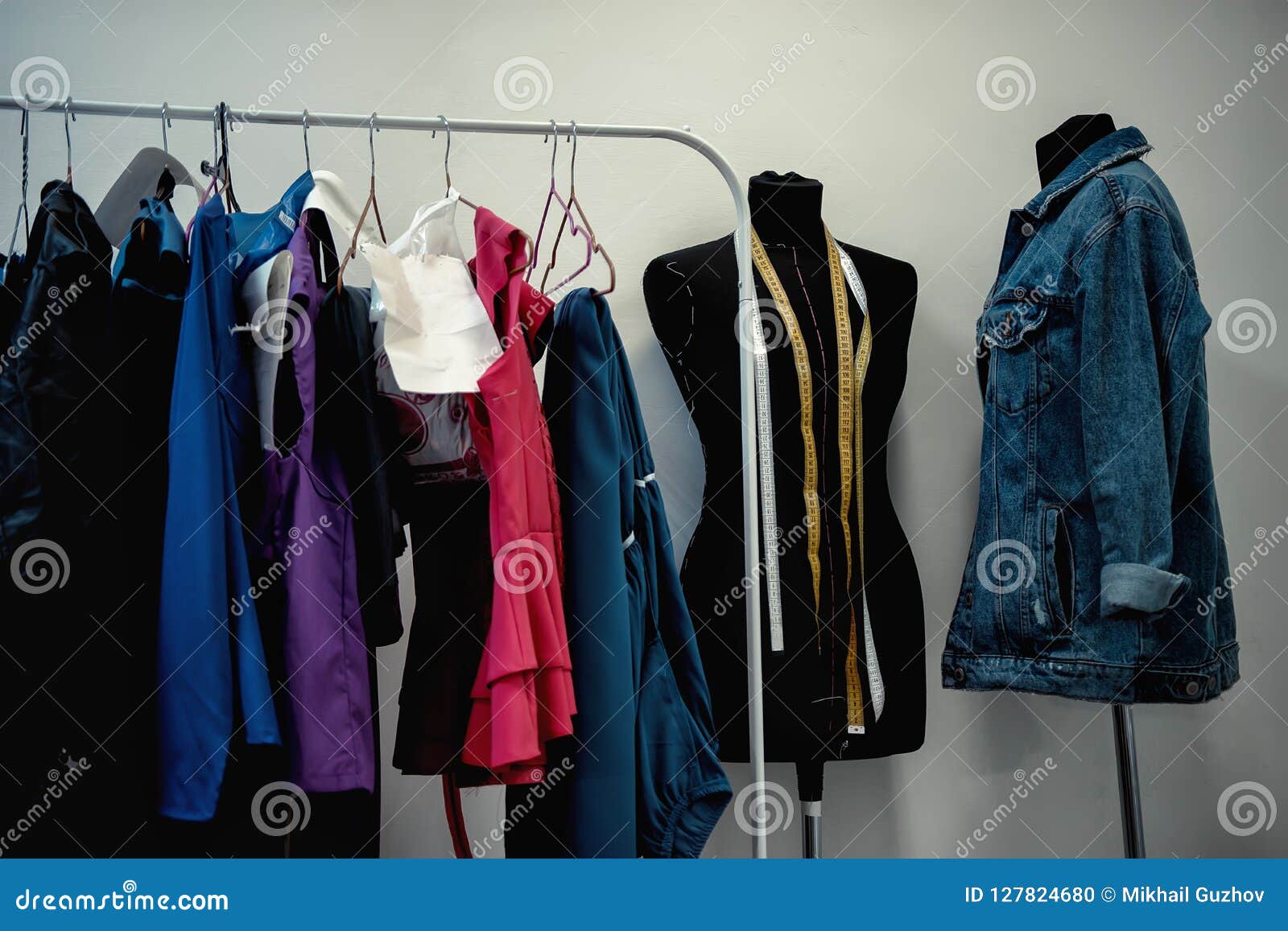 Clothes Hanging on the Hanger in the Dressing Room Stock Photo Image