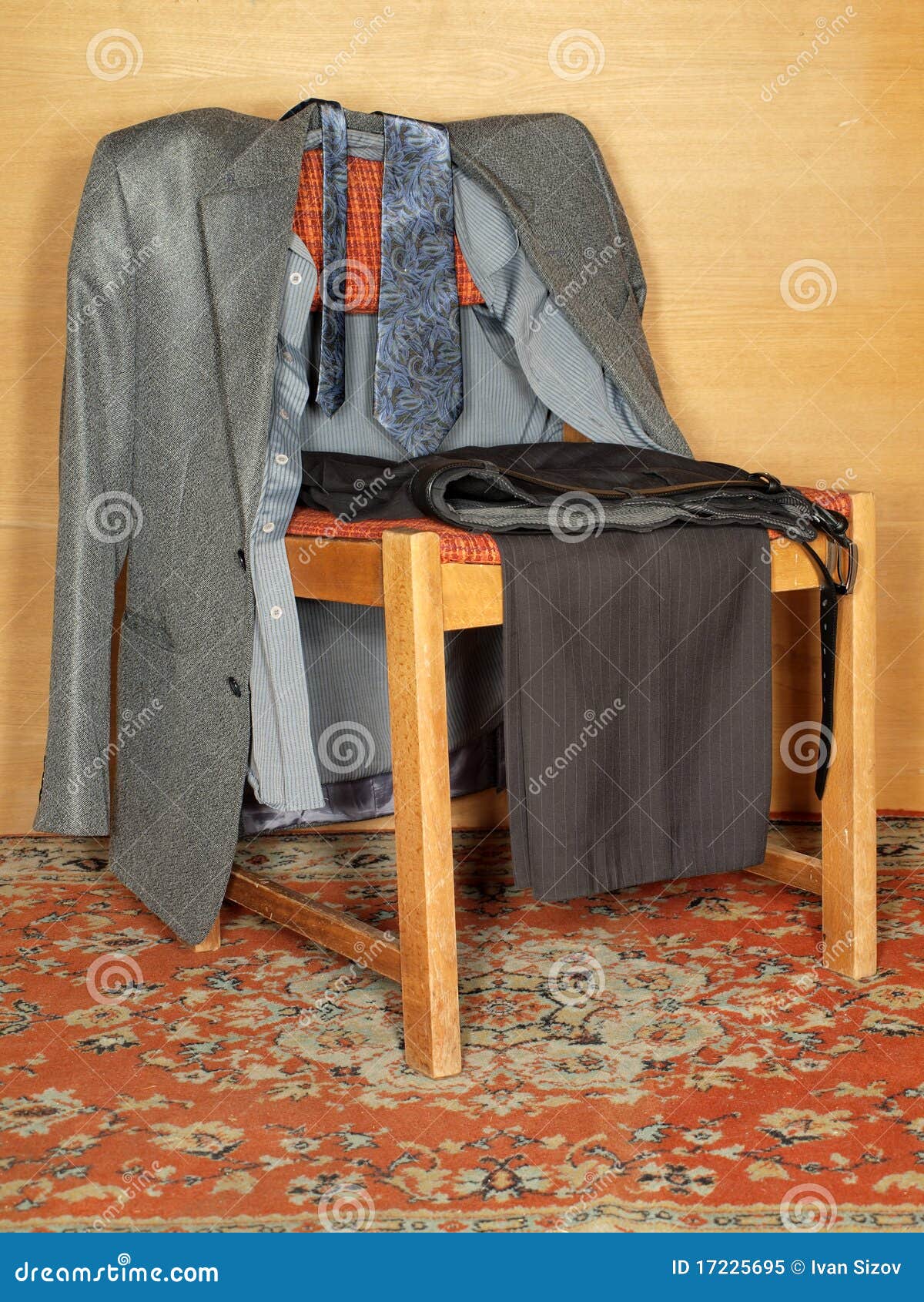 women clothing hanging on chair