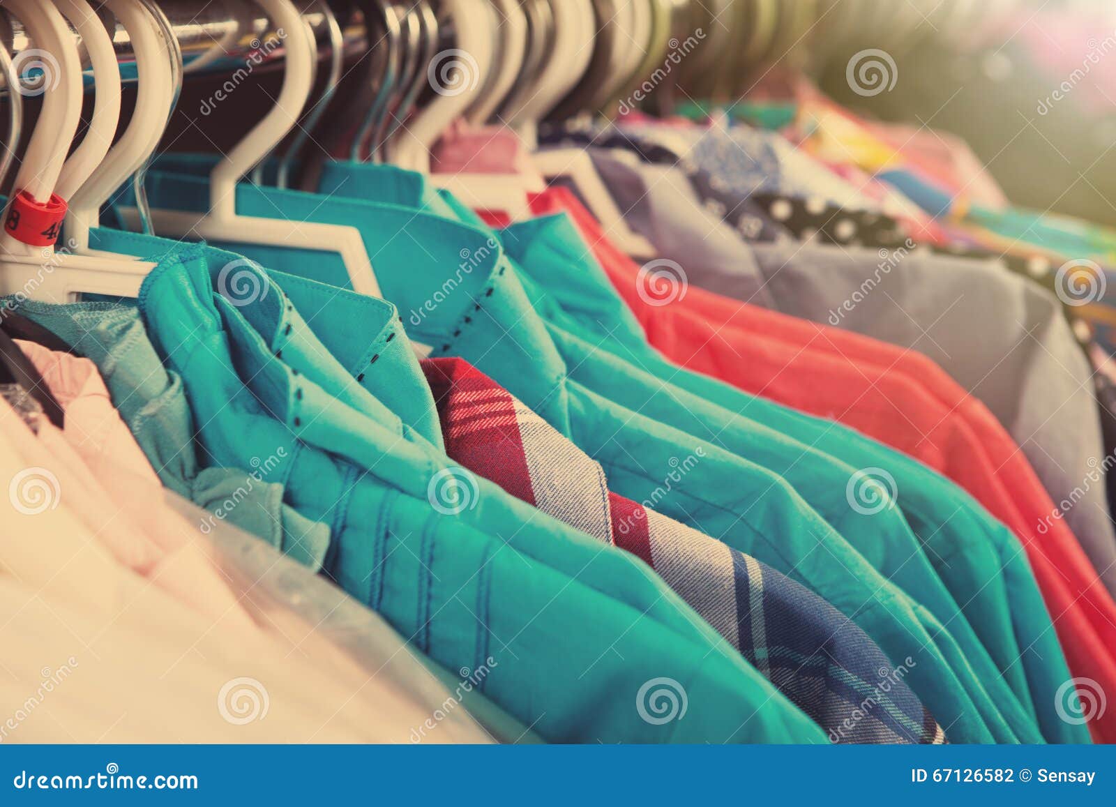 Clothes Hanging on the Rack in the Store Stock Photo Image of