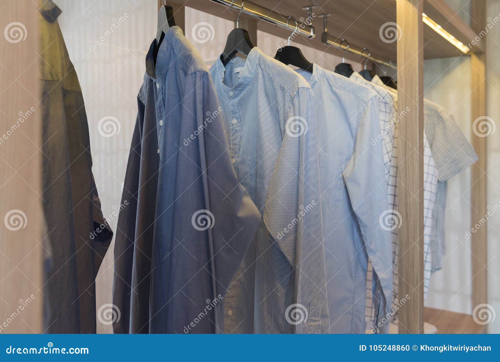 Clothes Hanging on Rail in Modern Wardrobe Stock Photo - Image of hook ...