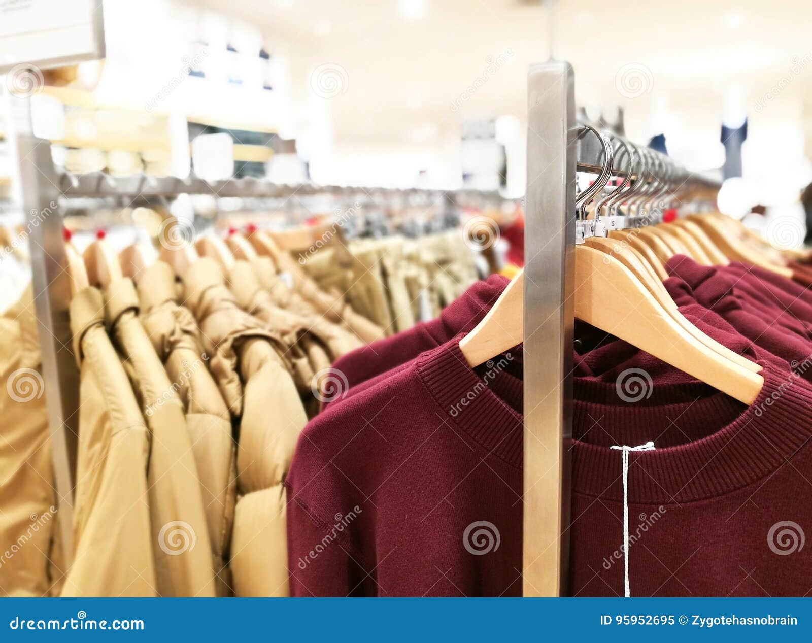 Clothes Hanging In The Railing, Showing Size Stock Image - Image of ...