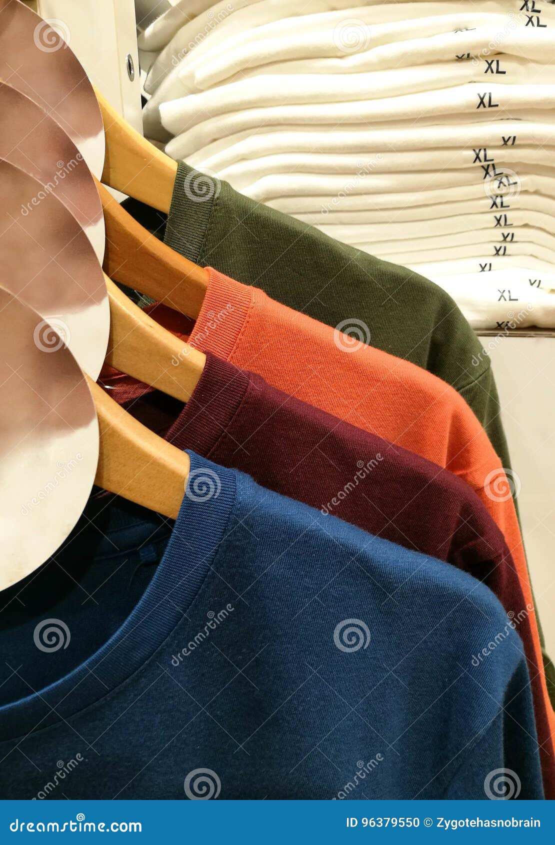 Clothes Hanging in the Railing, Showing Size Stock Photo - Image of ...