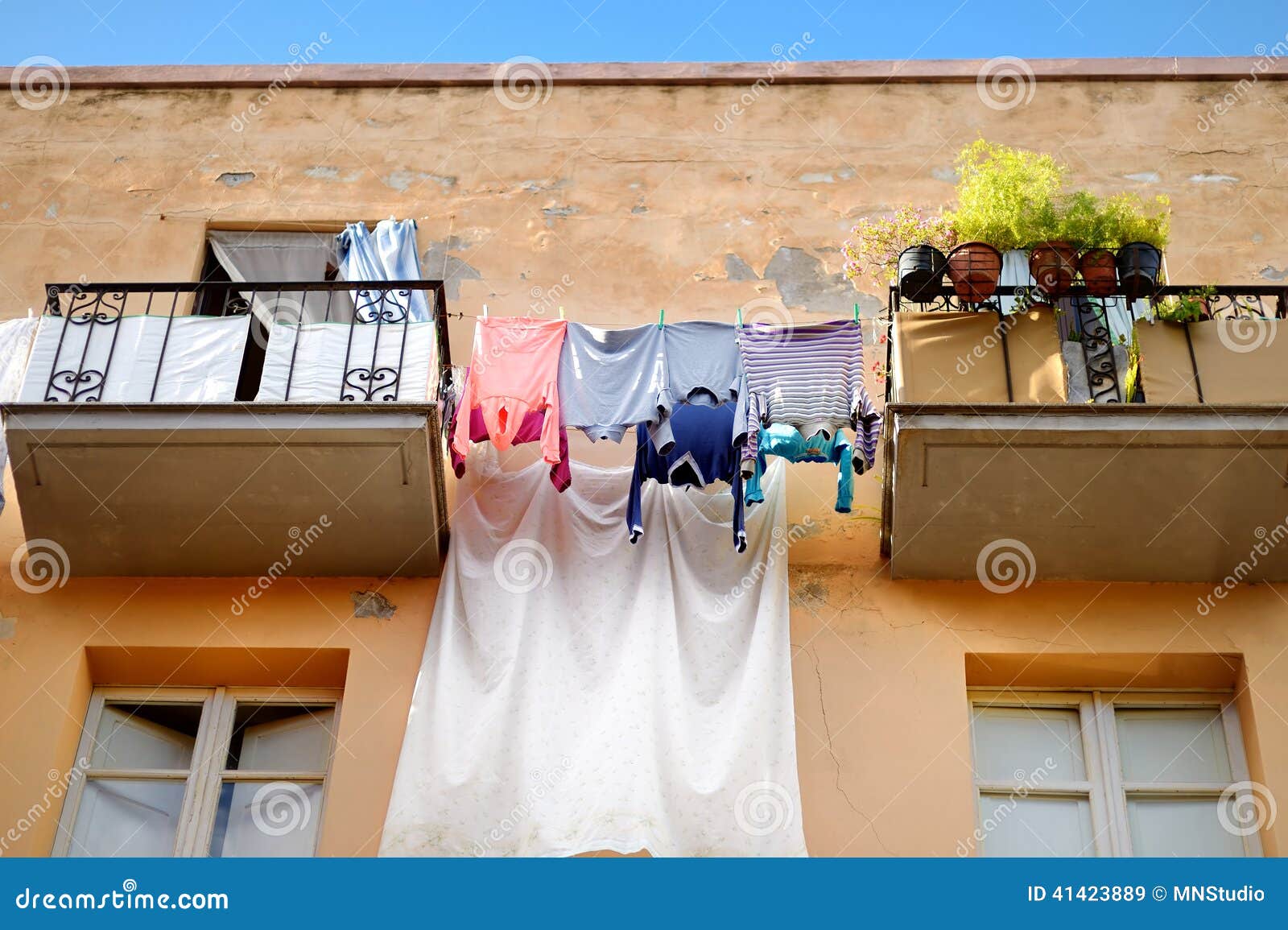 Clothes on the Line Along Balkonies Stock Image Image of green, home