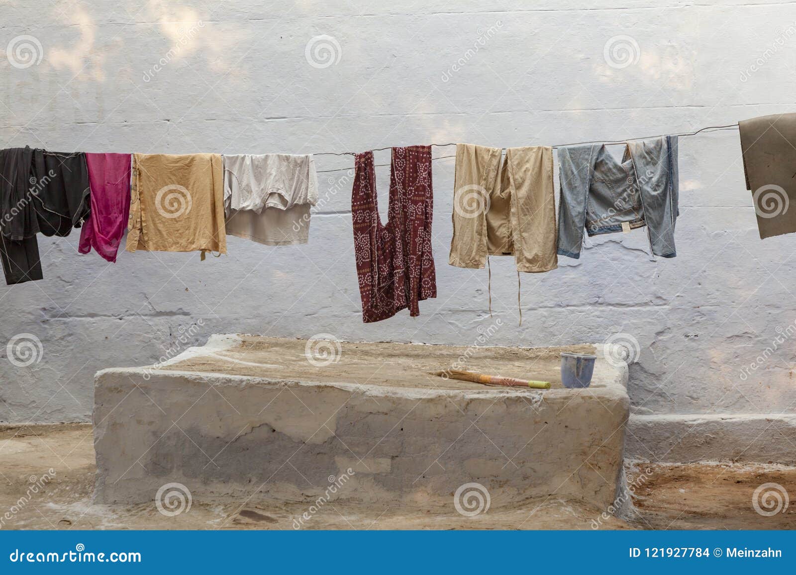 Clothes Line with Clothings in a Typical Indian House Stock Photo - Image  of line, house: 121927784, image size:1600x1157