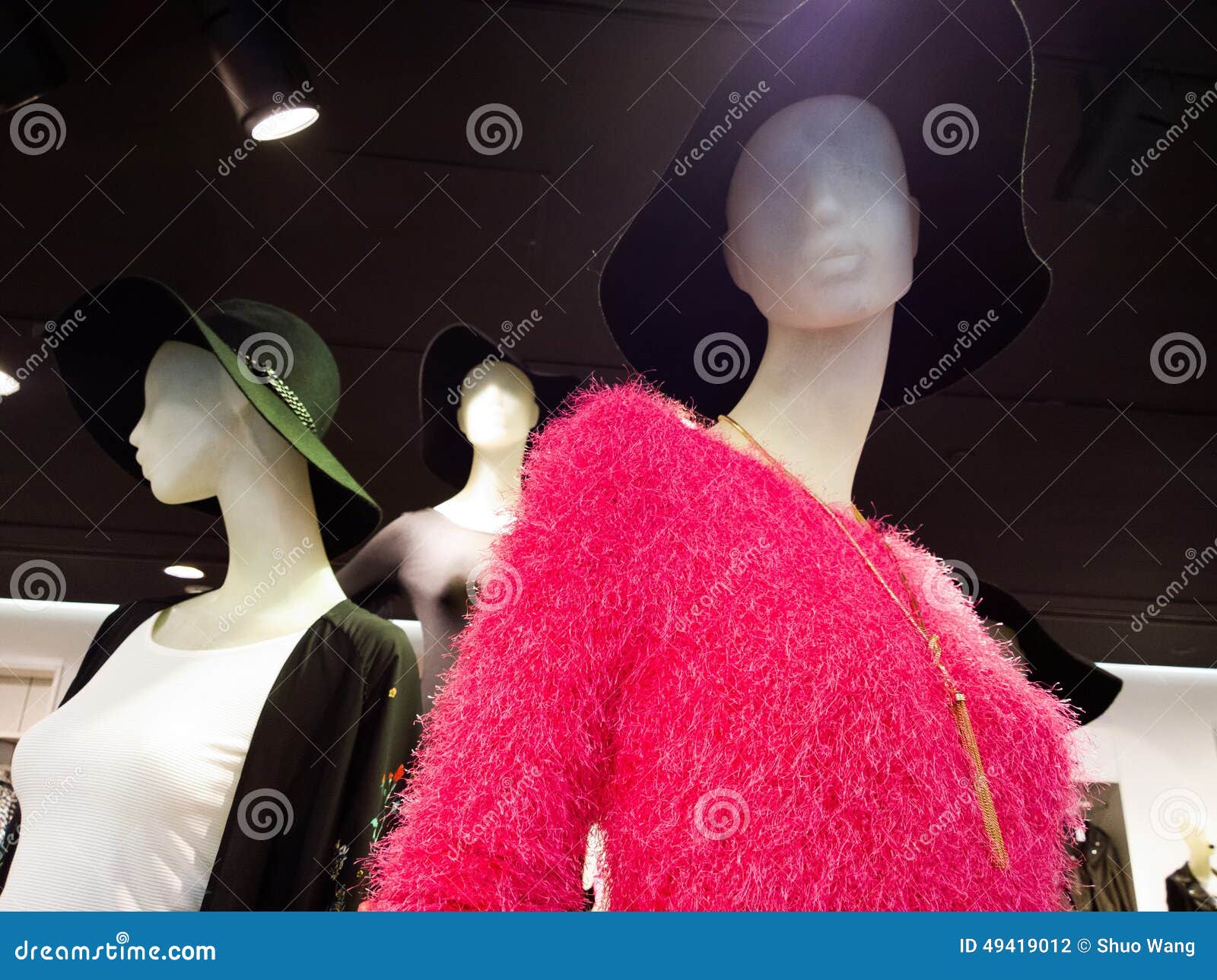 Clothes on mannequins stock photo. Image of clothing 49419012