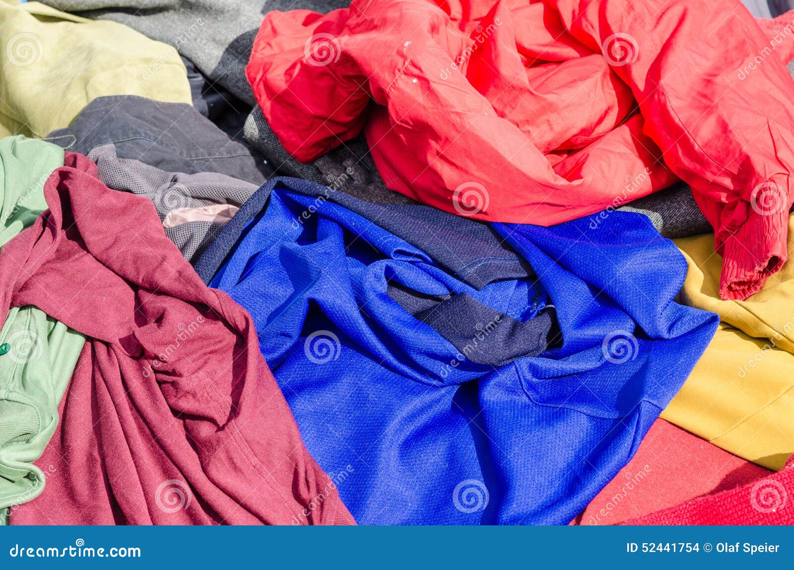 Clothes on a market stall stock photo. Image of garage - 52441754