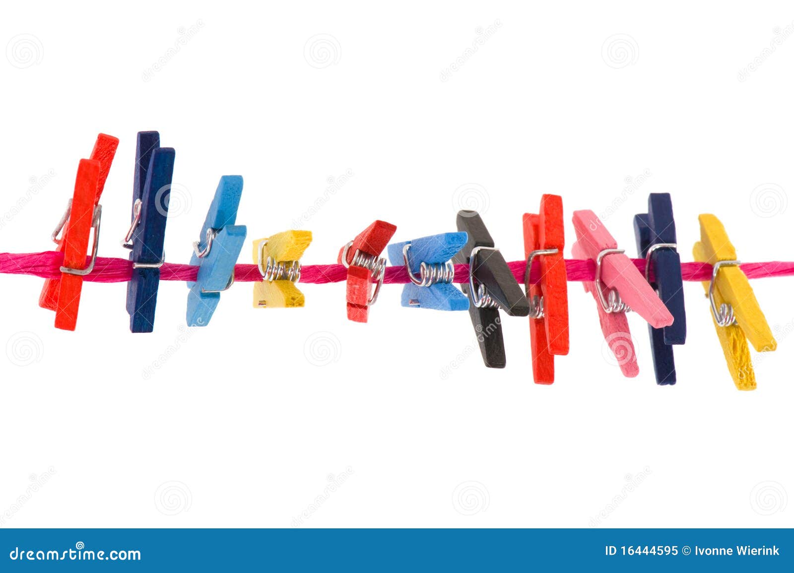 Clothes pins stock image. Image of yellow, pegs, rope 16444595