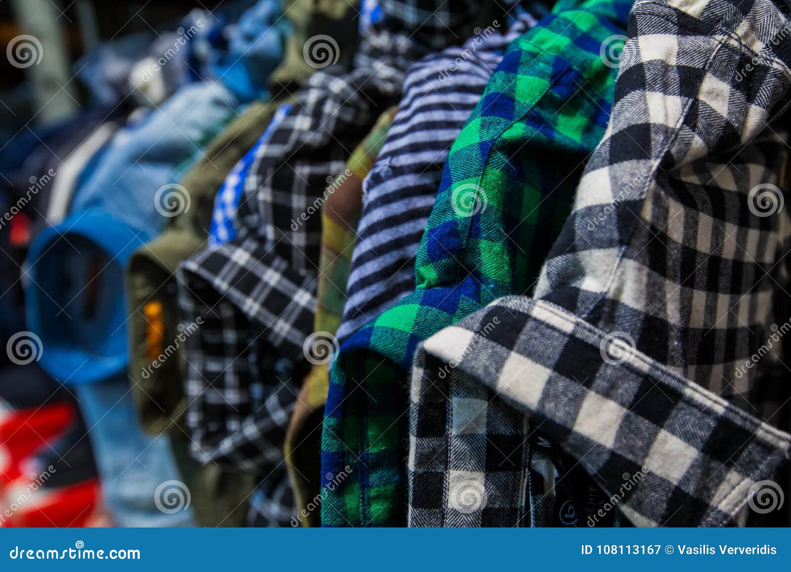 Clothes on Store Shelf at a Clothing Department Editorial Photography ...