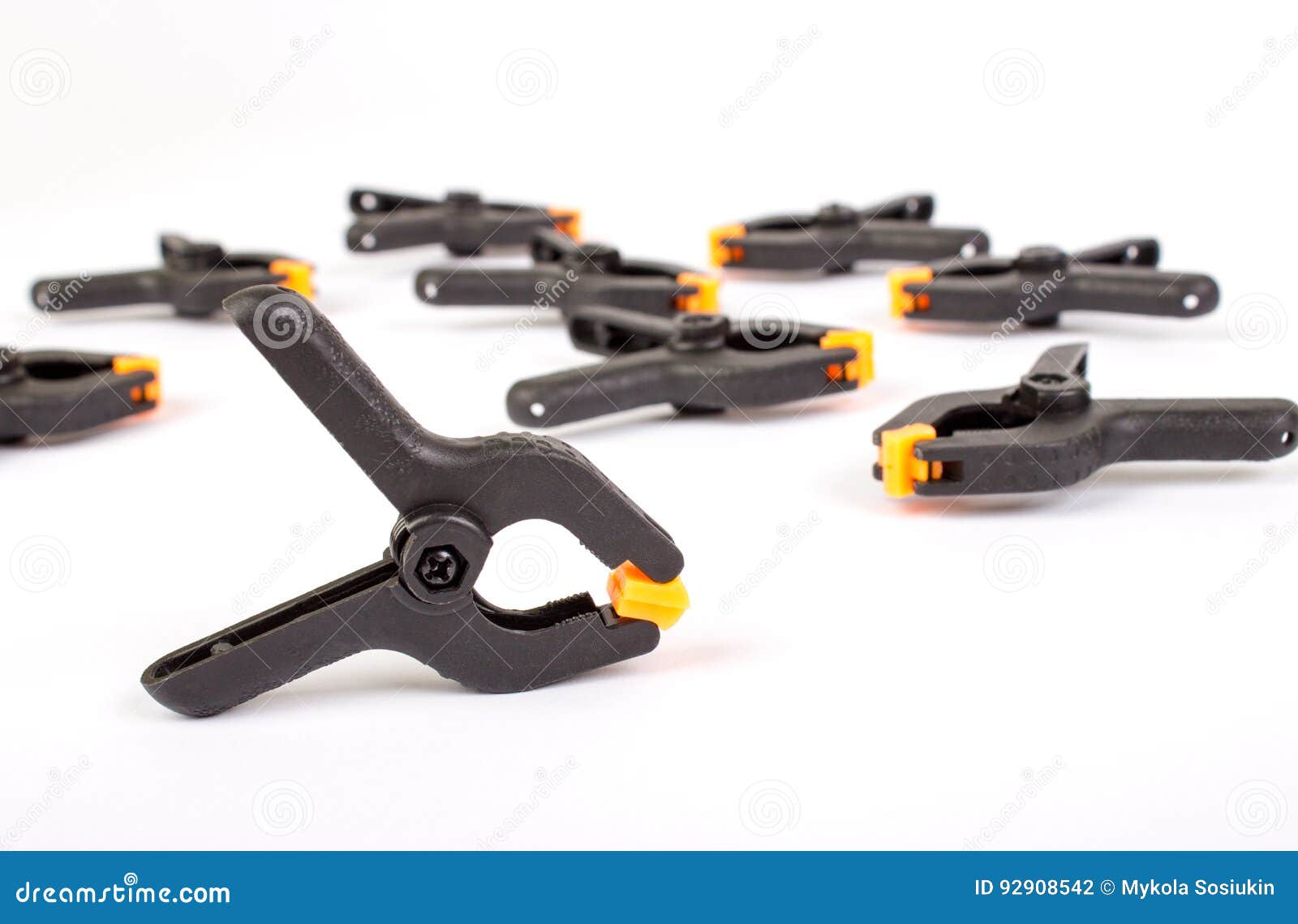 Clothespin. Carpentry Clamps. Plastic Clothespin on a White. Stock