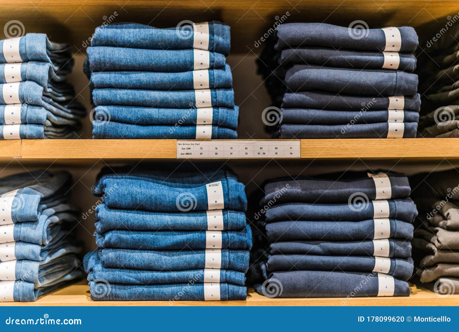 Clothing Products on the Shelf in a Clothing Store Stock Photo - Image ...