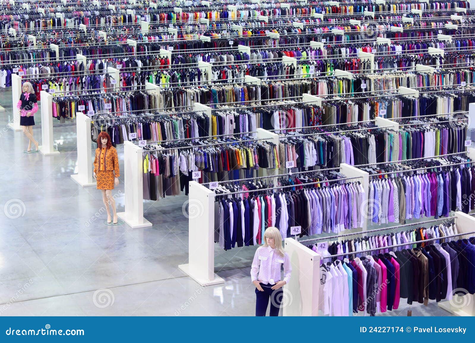 Clothing Store Dummies And Rows With Hangers Stock Photo 