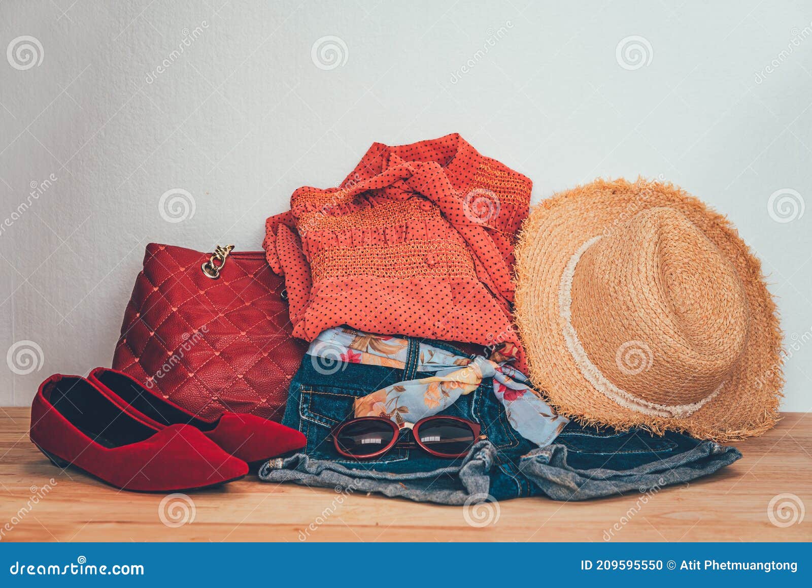 Clothing for Women, Placed on a Wooden Floor Stock Photo - Image of ...