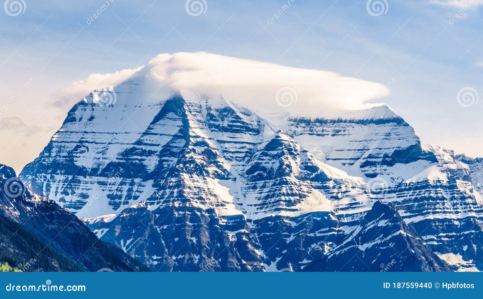 cloud blanket over mount robson, the highest mountain in the canadian rockies