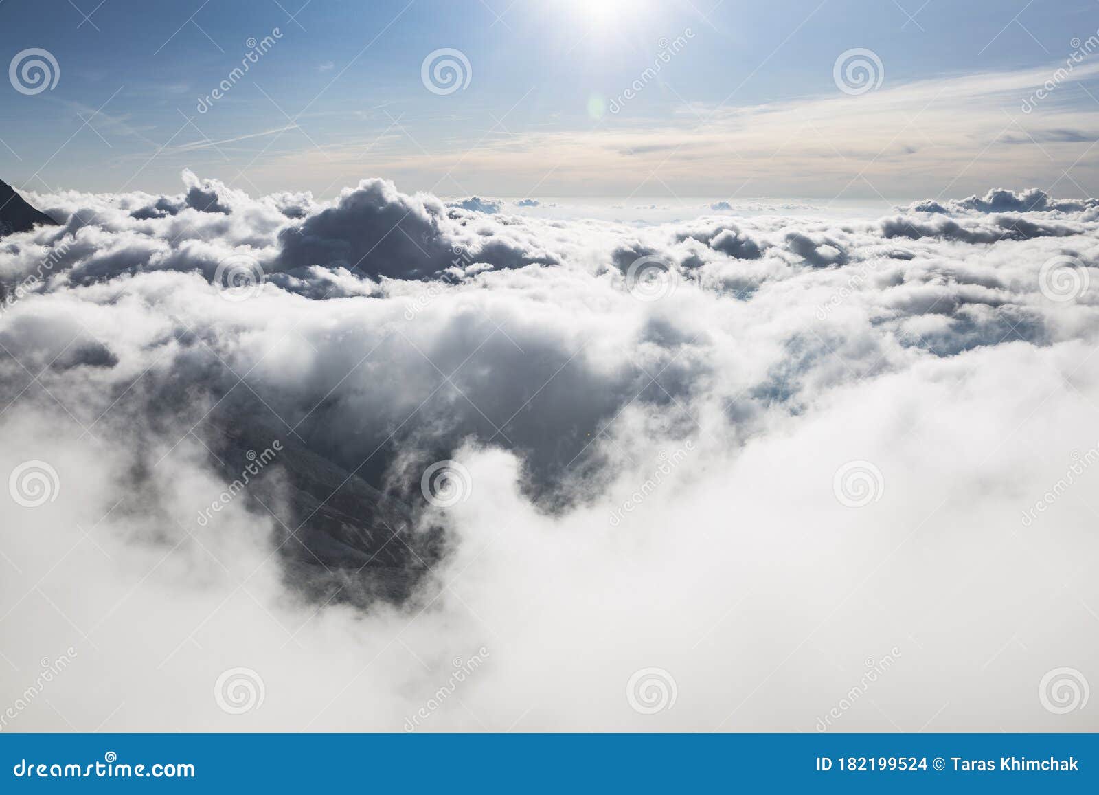 clouds and fog over the chamonix valley. view from the cosmique refuge, chamonix, france. perfect moment in alpine highlands