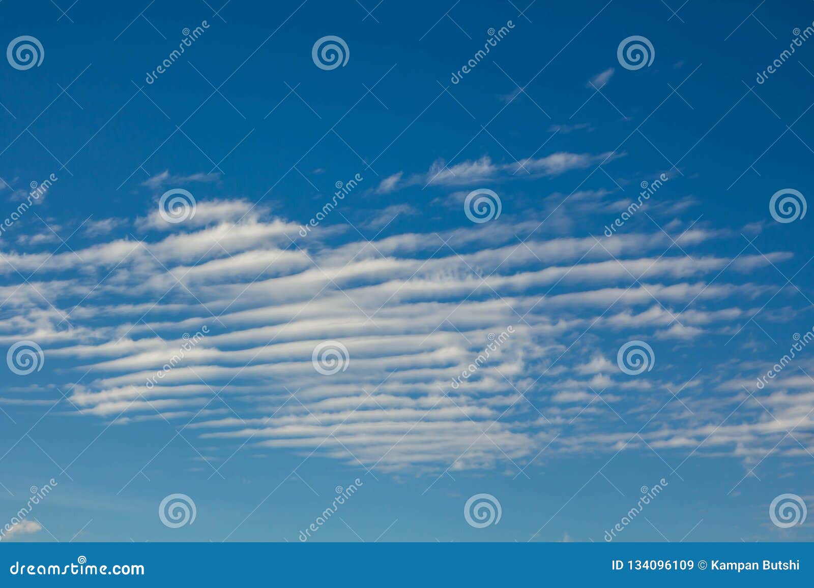 Clouds formed is lines analogous the desert.